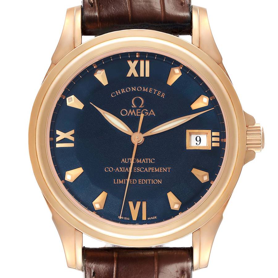 The Omega De Ville watch is shown from a front angle, highlighting its dial, case, crown, and part of the leather strap.