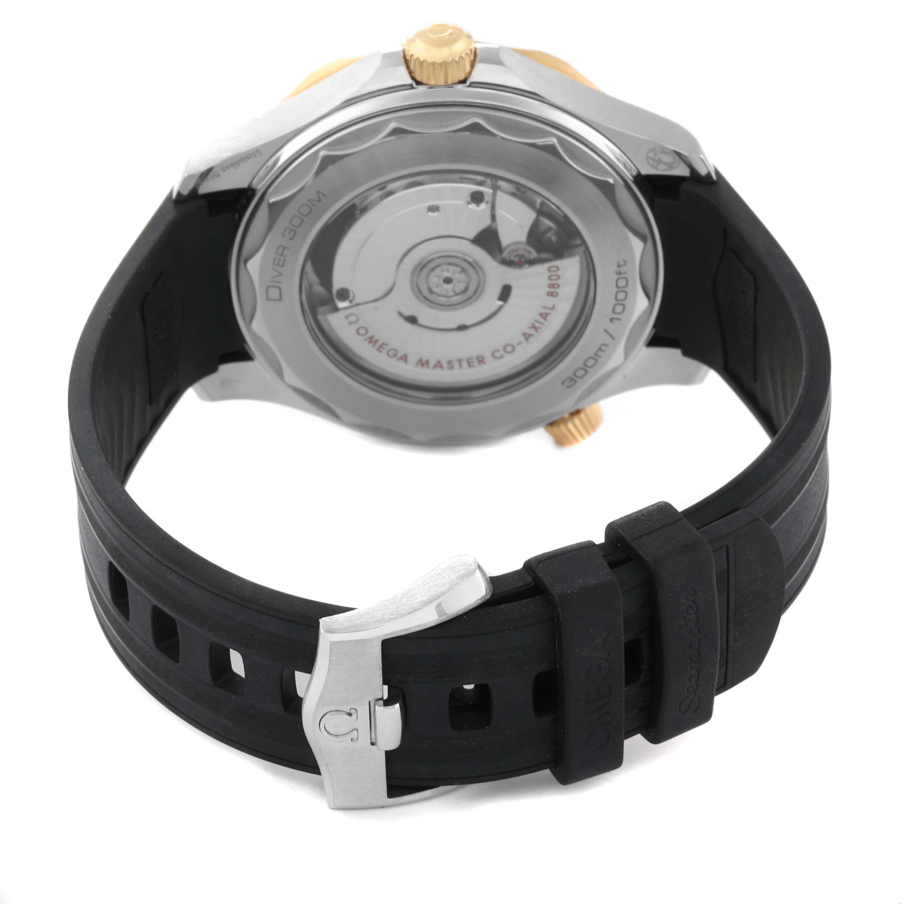 The image shows the back and clasp side of an Omega Seamaster 210.22.42.20.01.001 Men's Steel and Gold (two tone) Black Dial 210.22.42.20.01.001 Men's Steel and Gold (two tone) Black Dial watch, highlighting its case back, strap, and buckle.