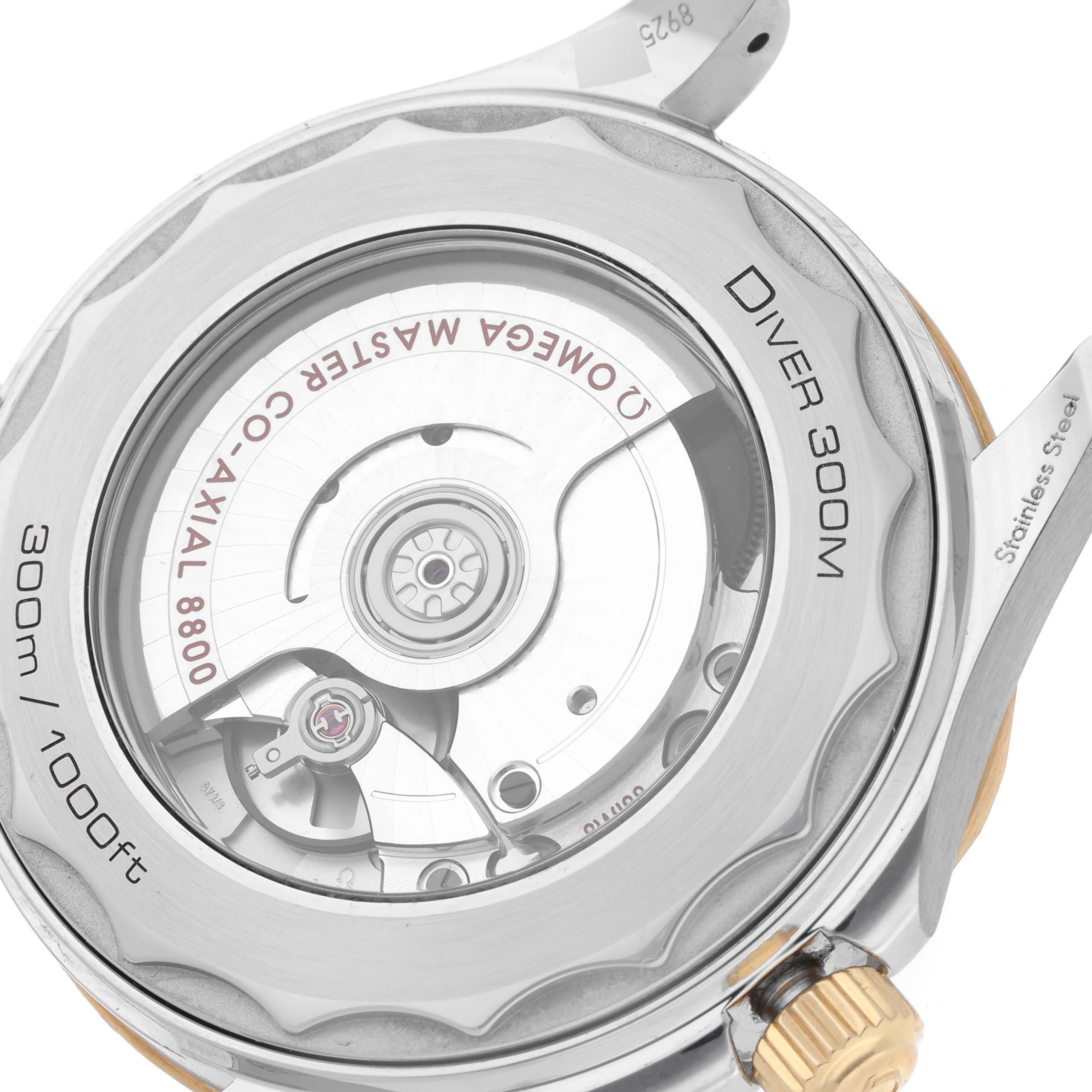 The image shows the back view of the Omega Seamaster 210.22.42.20.01.001 Men's Steel and Gold (two tone) Black Dial 210.22.42.20.01.001 Men's Steel and Gold (two tone) Black Dial Diver 300M watch, highlighting the movement and water resistance.