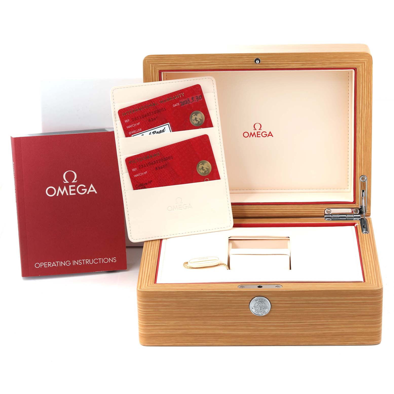 The image shows an Omega Aqua Terra 231.10.43.22.03.001 Men
s Stainless Steel Blue Dial 231.10.43.22.03.001 Men
s Stainless Steel Blue Dial watch box set, including the operating instructions, warranty cards, and wooden case.