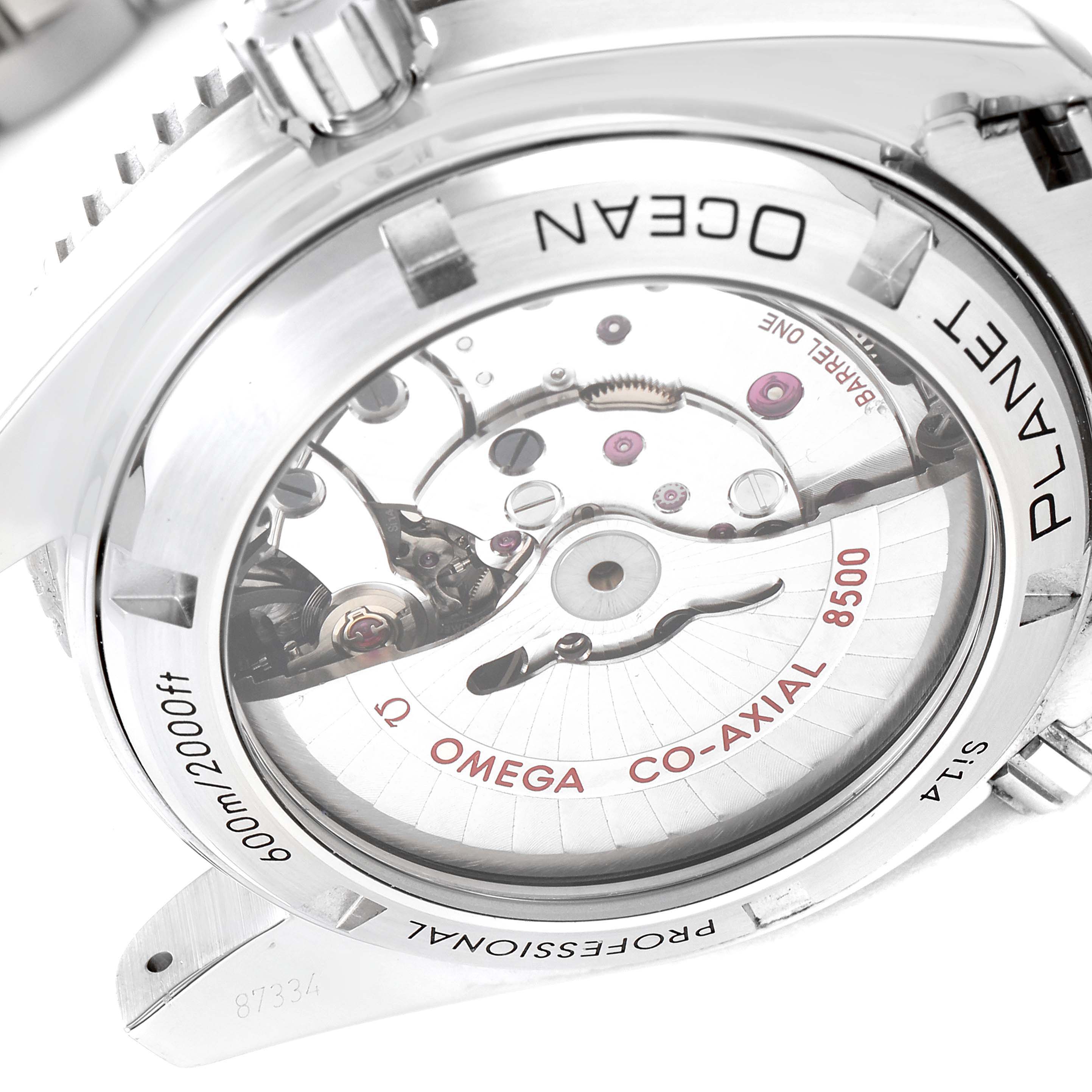 The image shows the back view of the Omega Planet Ocean 232.30.42.21.01.003 Men
s Stainless Steel Black Dial 232.30.42.21.01.003 Men
s Stainless Steel Black Dial watch, highlighting its transparent case back and visible movement.