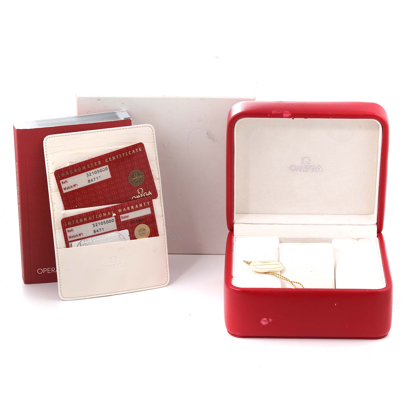 The image shows the Omega Speedmaster 3210.50.00 Men
s Stainless Steel Black Dial 3210.50.00 Men
s Stainless Steel Black Dial watch packaging, including an open box, warranty cards, and user manual, from a straight-on angle.