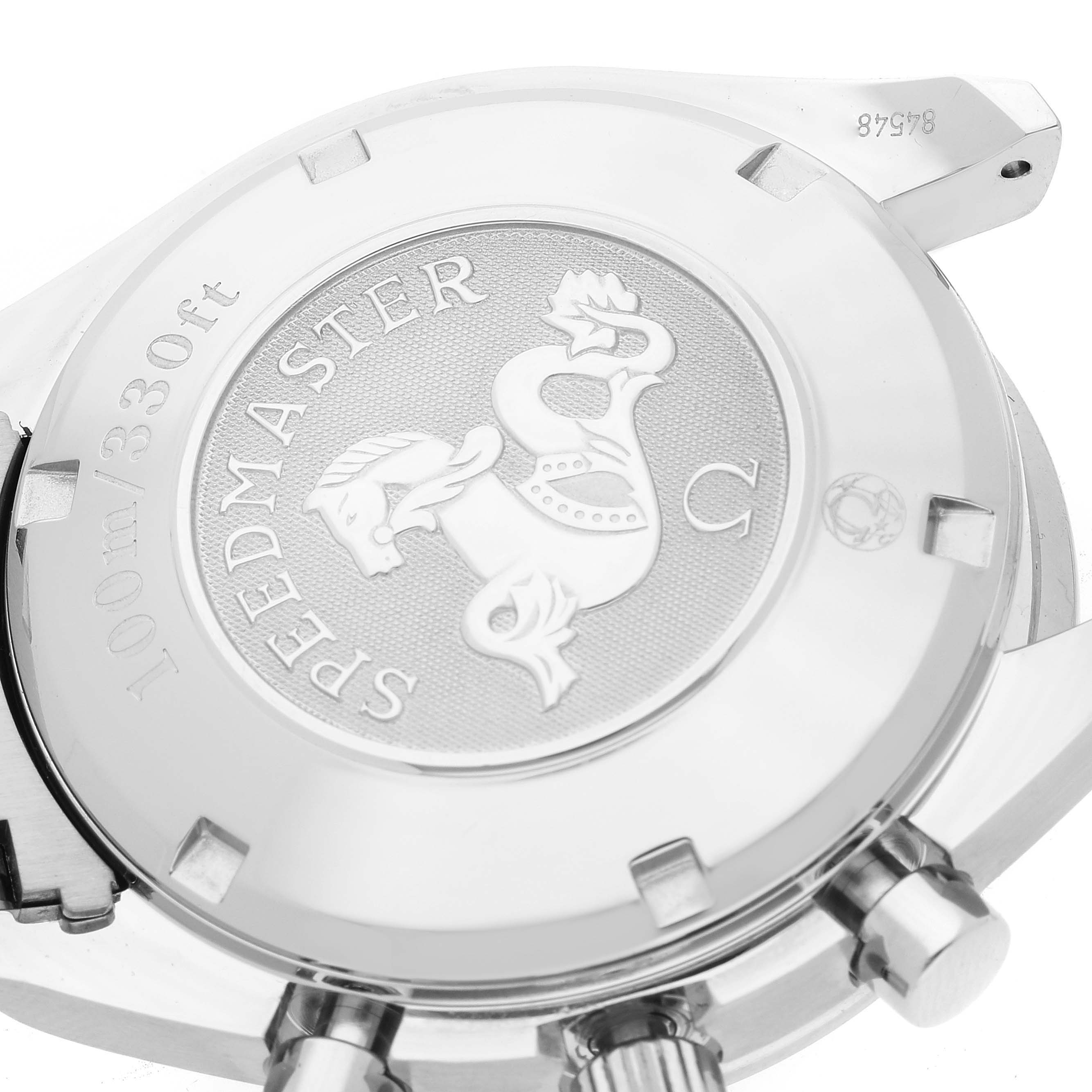 The image shows the back case and crown of an Omega Speedmaster 3220.50.00 Men
s Stainless Steel Black Dial 3220.50.00 Men
s Stainless Steel Black Dial watch, highlighting the embossed emblem and depth rating.