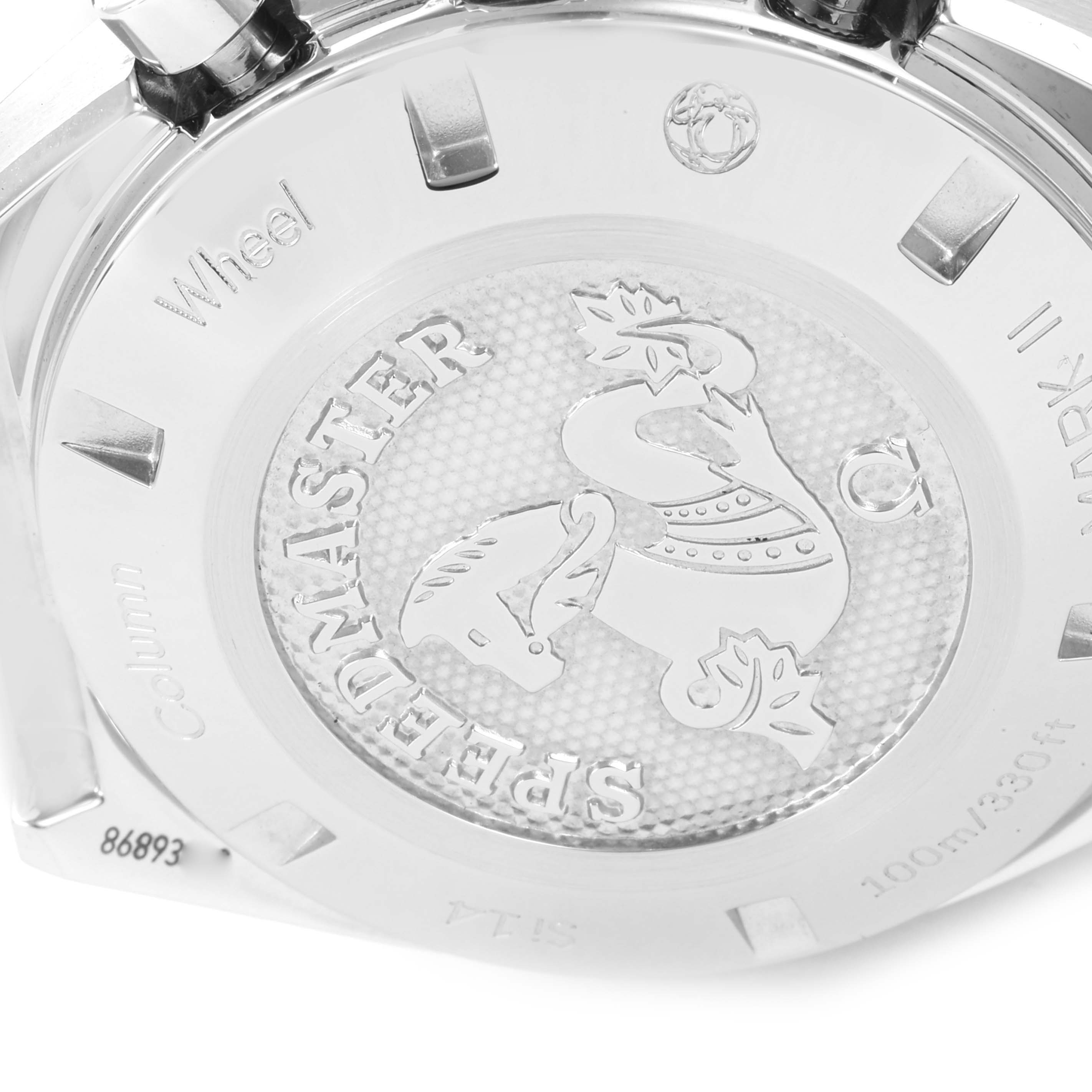 This image shows the case back of an Omega Speedmaster 327.10.43.50.06.001 Men's Stainless Steel Grey Dial 327.10.43.50.06.001 Men's Stainless Steel Grey Dial watch, featuring engraved details and decorative elements.