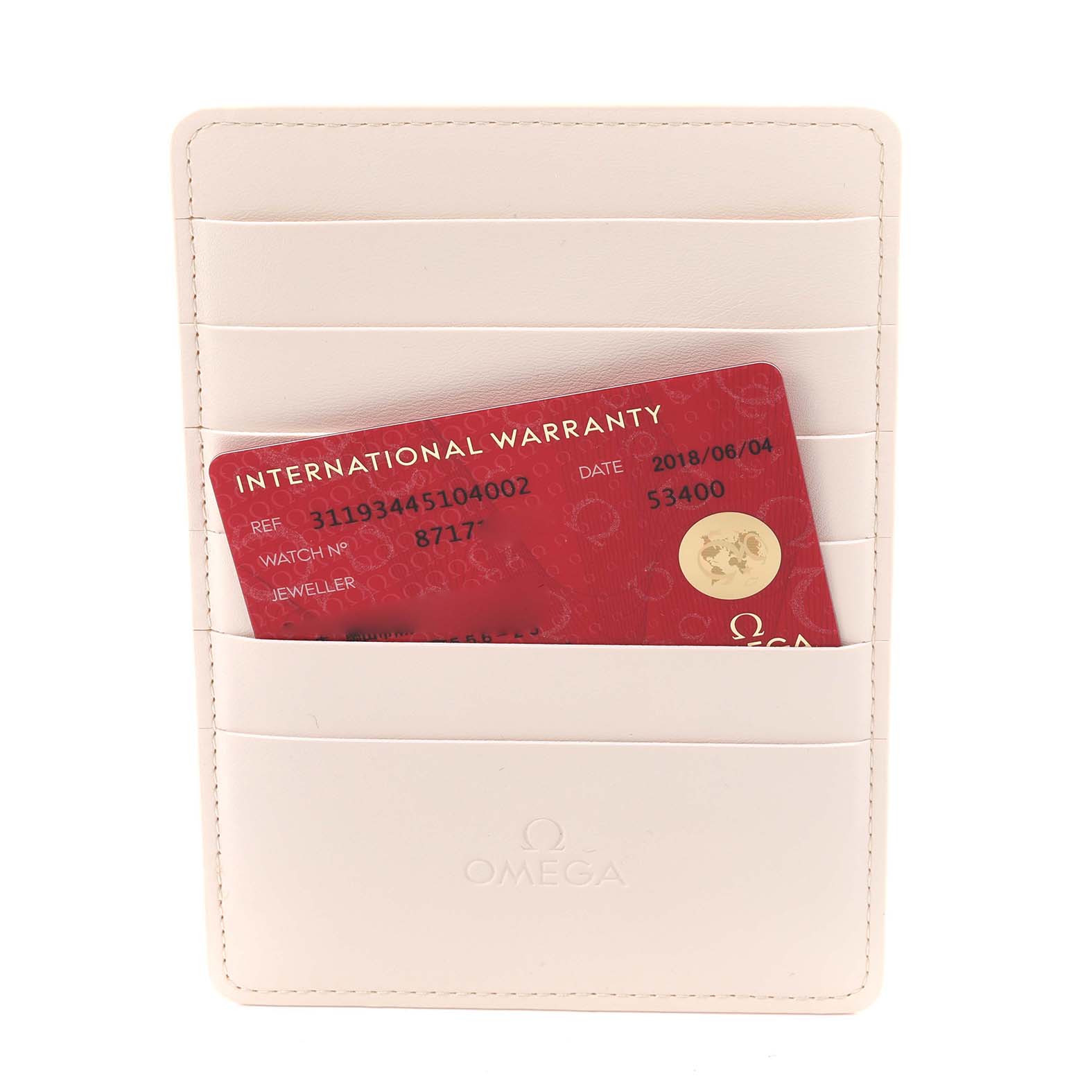 The image shows an Omega Speedmaster 311.93.44.51.04.002 Men's Ceramic White Dial 311.93.44.51.04.002 Men's Ceramic White Dial International Warranty card in a cardholder.