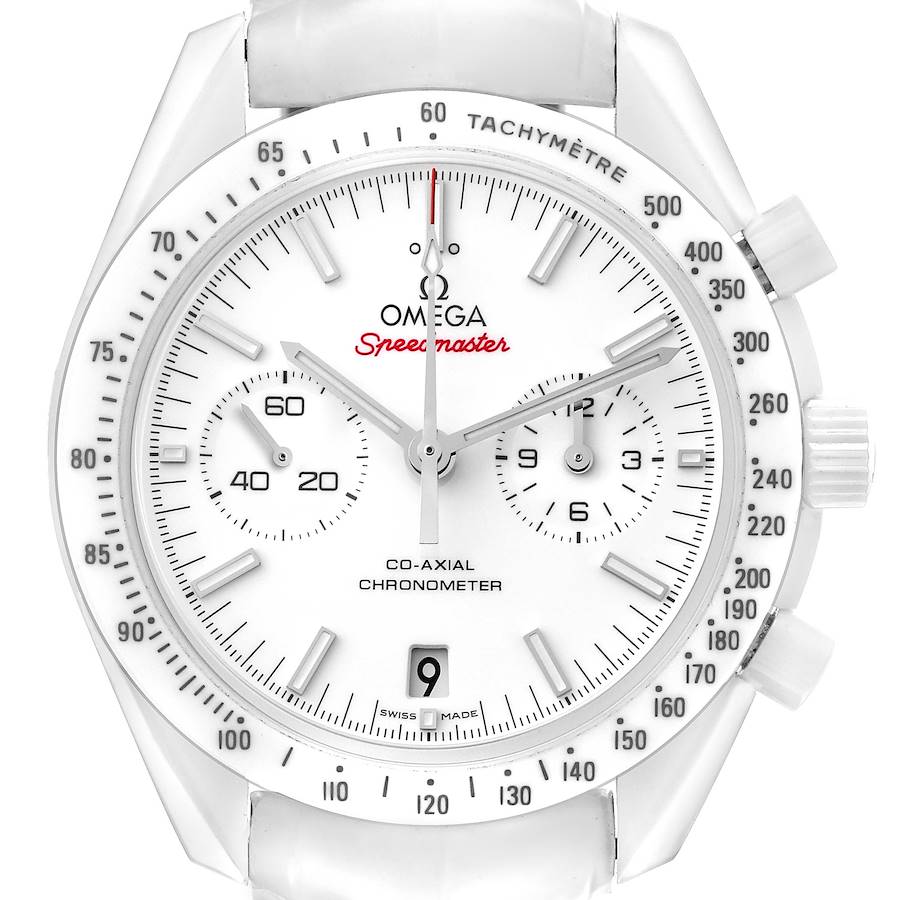 The Omega Speedmaster watch is shown from a front angle, displaying the face, bezel, subdials, and tachymetric scale.