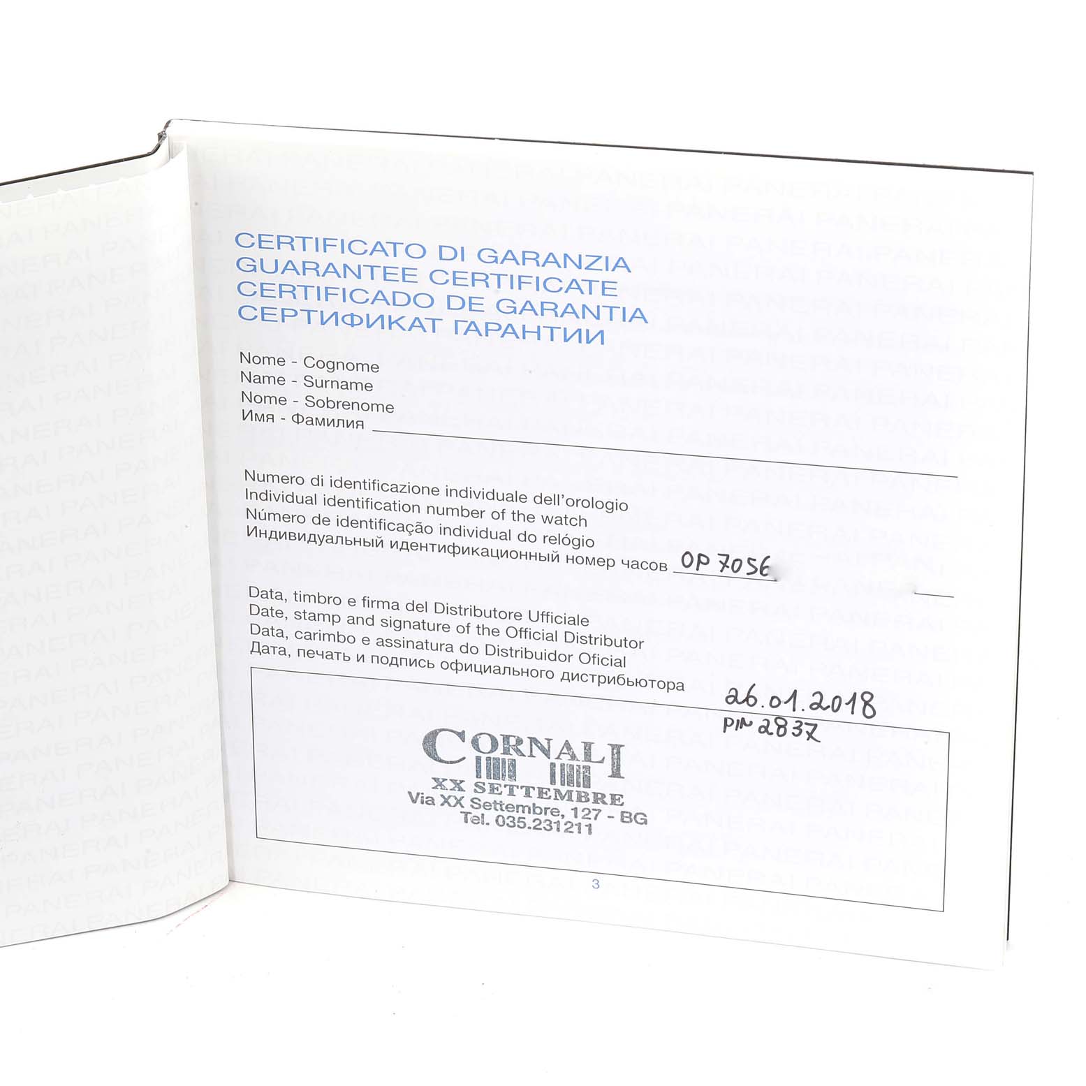 This image shows the warranty certificate for a Luminor model by Panerai, including the identification number and distributor information.