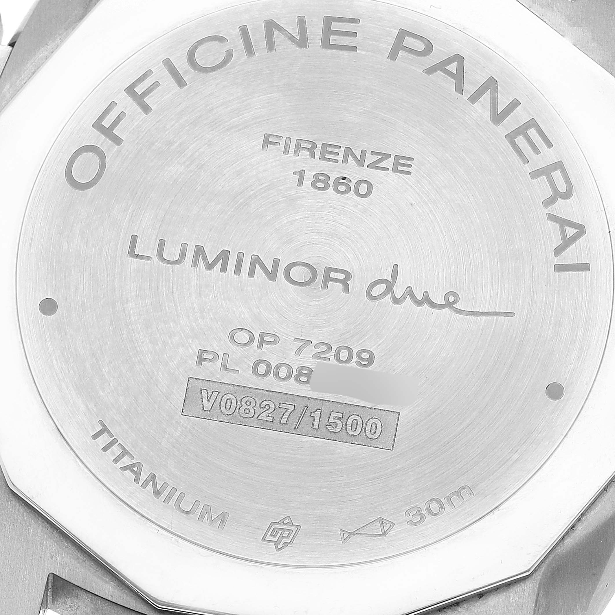 The image shows the case back of a Luminor Due model by Panerai, highlighting its engravings and serial numbers.