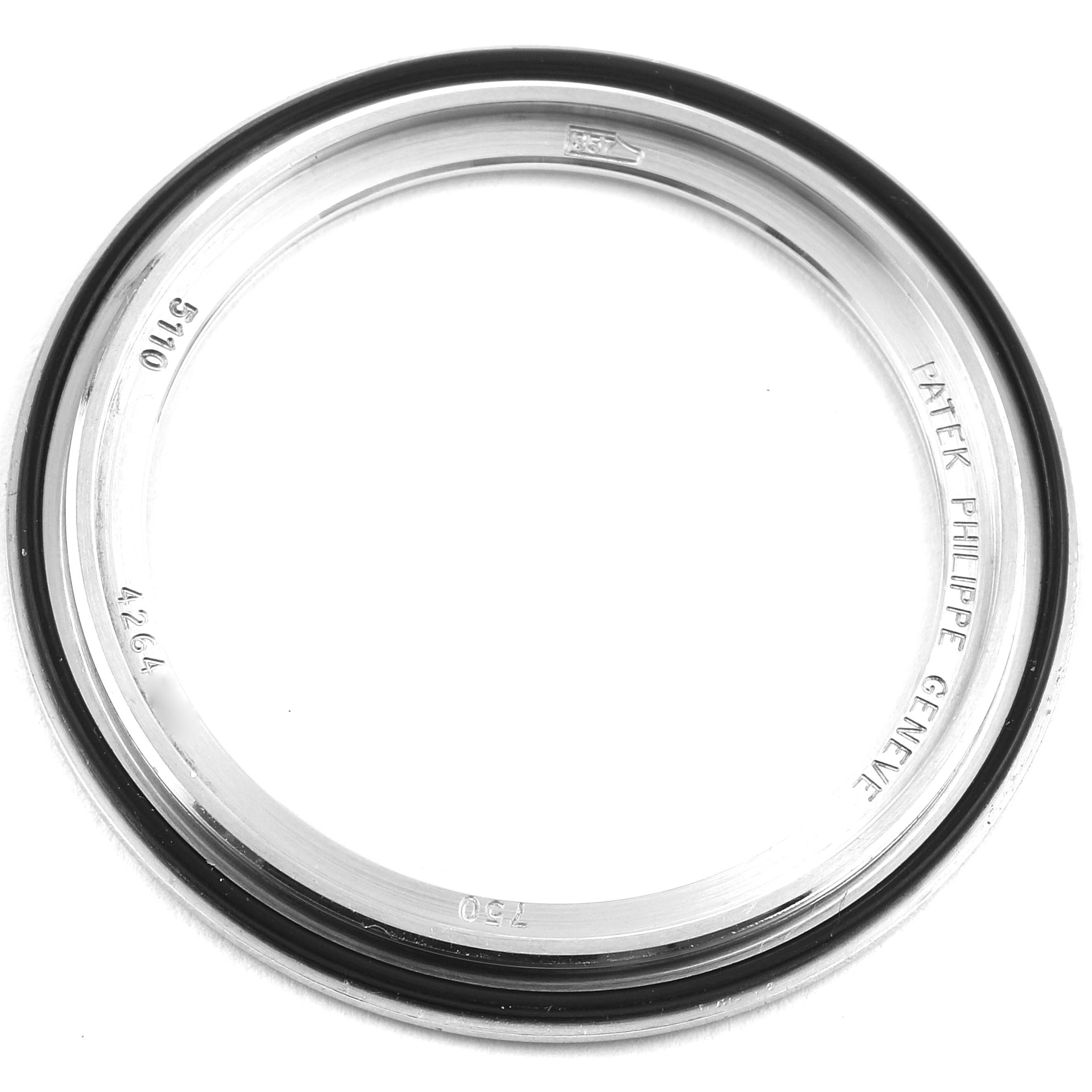 This image shows the inner bezel ring for a Calatrava model by Patek Philippe, viewed from above.