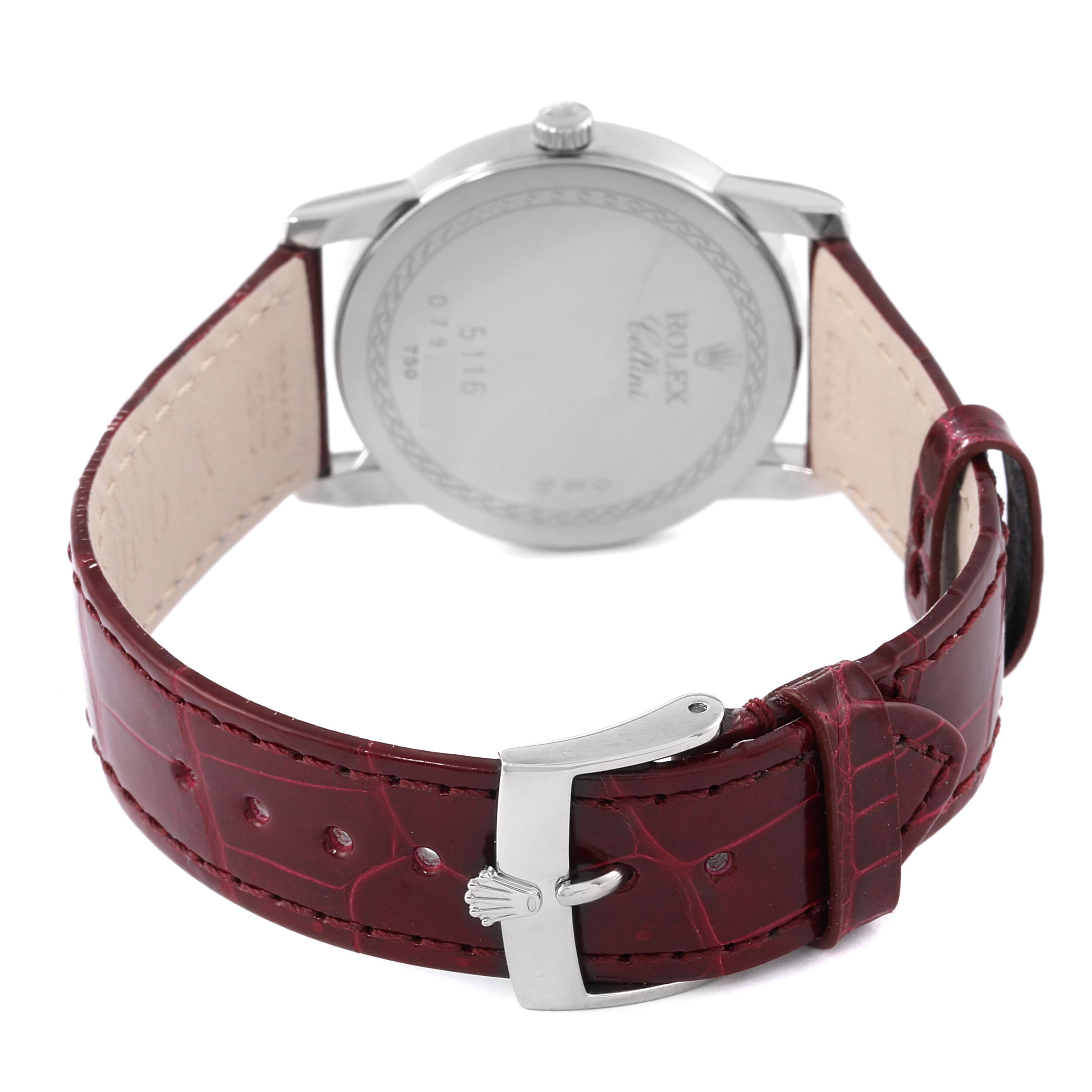This image shows the back of a Rolex Cellini 5116 Men's White Gold Beige Dial 5116 Men's White Gold Beige Dial watch, highlighting its case back and red leather strap with a buckle.