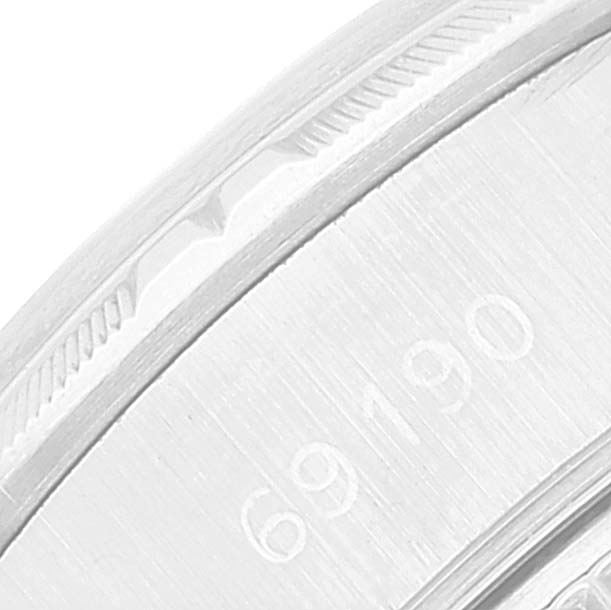 The image shows a close-up of the side of the Rolex Date 69190 Women's Stainless Steel White Dial 69190 Women's Stainless Steel White Dial model's case, highlighting the model number and part of the bezel.
