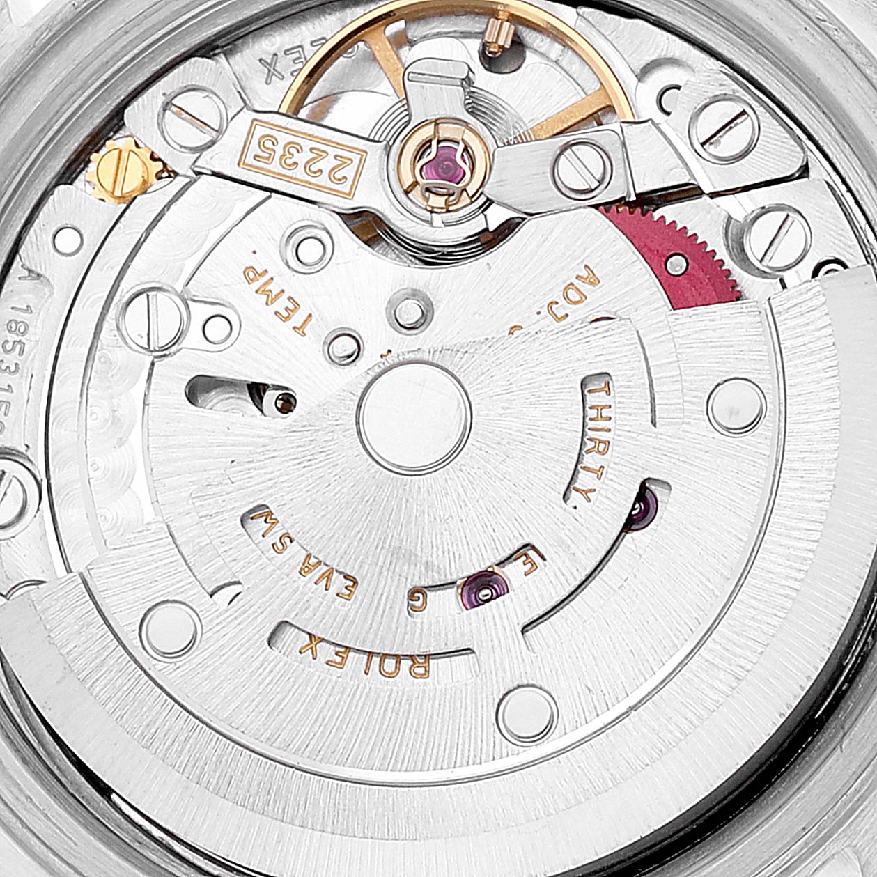 The image shows the movement mechanism of a Rolex Datejust 79174 Women's Stainless Steel Black Dial 79174 Women's Stainless Steel Black Dial watch, showcasing intricate gears and components.