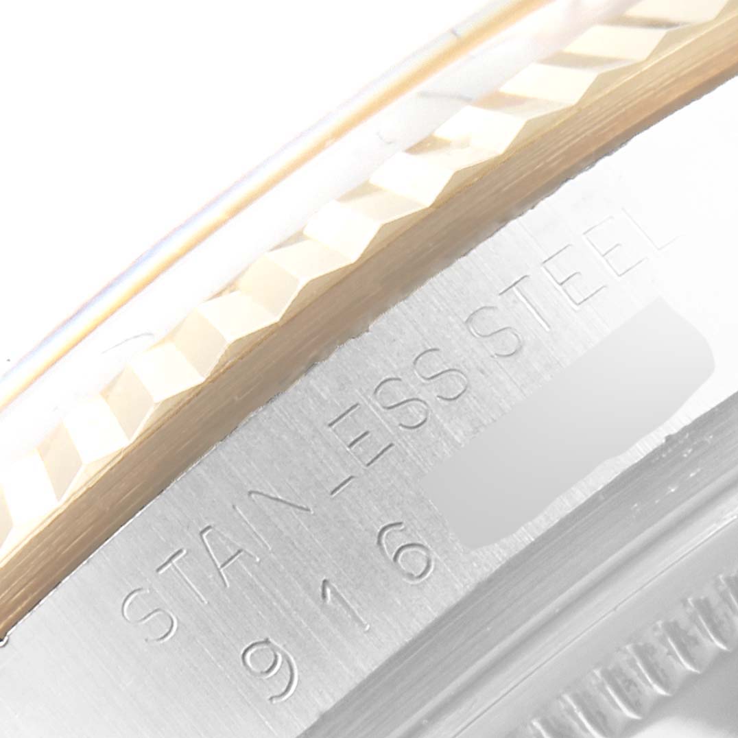 This image shows a close-up of the stainless steel case and fluted bezel of the Rolex Vintage Collection 16013 Men's Steel and Gold (two tone) Champagne Dial 16013 Men's Steel and Gold (two tone) Champagne Dial model.