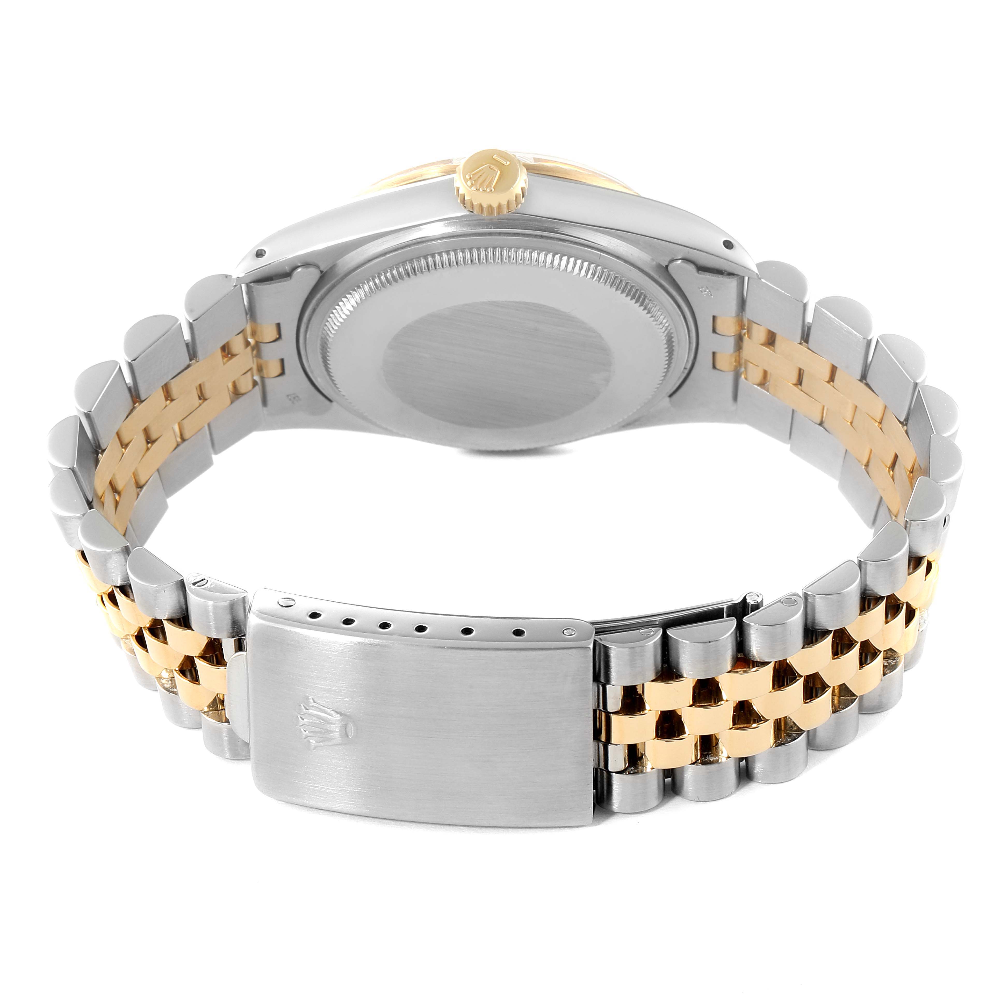 The image shows the back view of a Rolex Vintage Collection 16013 Men's Steel and Gold (two tone) Champagne Dial 16013 Men's Steel and Gold (two tone) Champagne Dial watch, highlighting its case, crown, and dual-tone bracelet with the clasp.