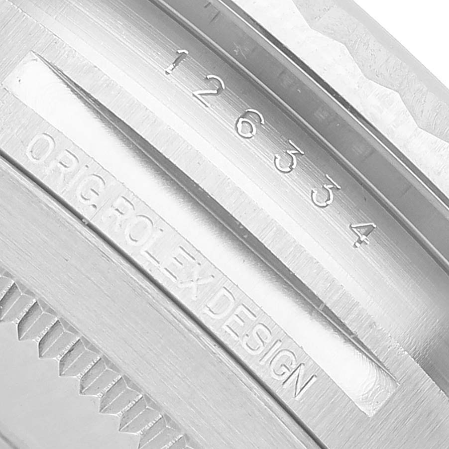 The image shows a close-up of the inner bezel with "ORIG. ROLEX DESIGN" and model number on the Rolex Datejust 41 126334 Men's Stainless Steel White Dial.