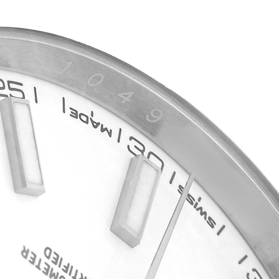 The image shows a close-up of the Rolex Datejust 41 126334 Men's Stainless Steel White Dial dial with index markers and partial bezel.