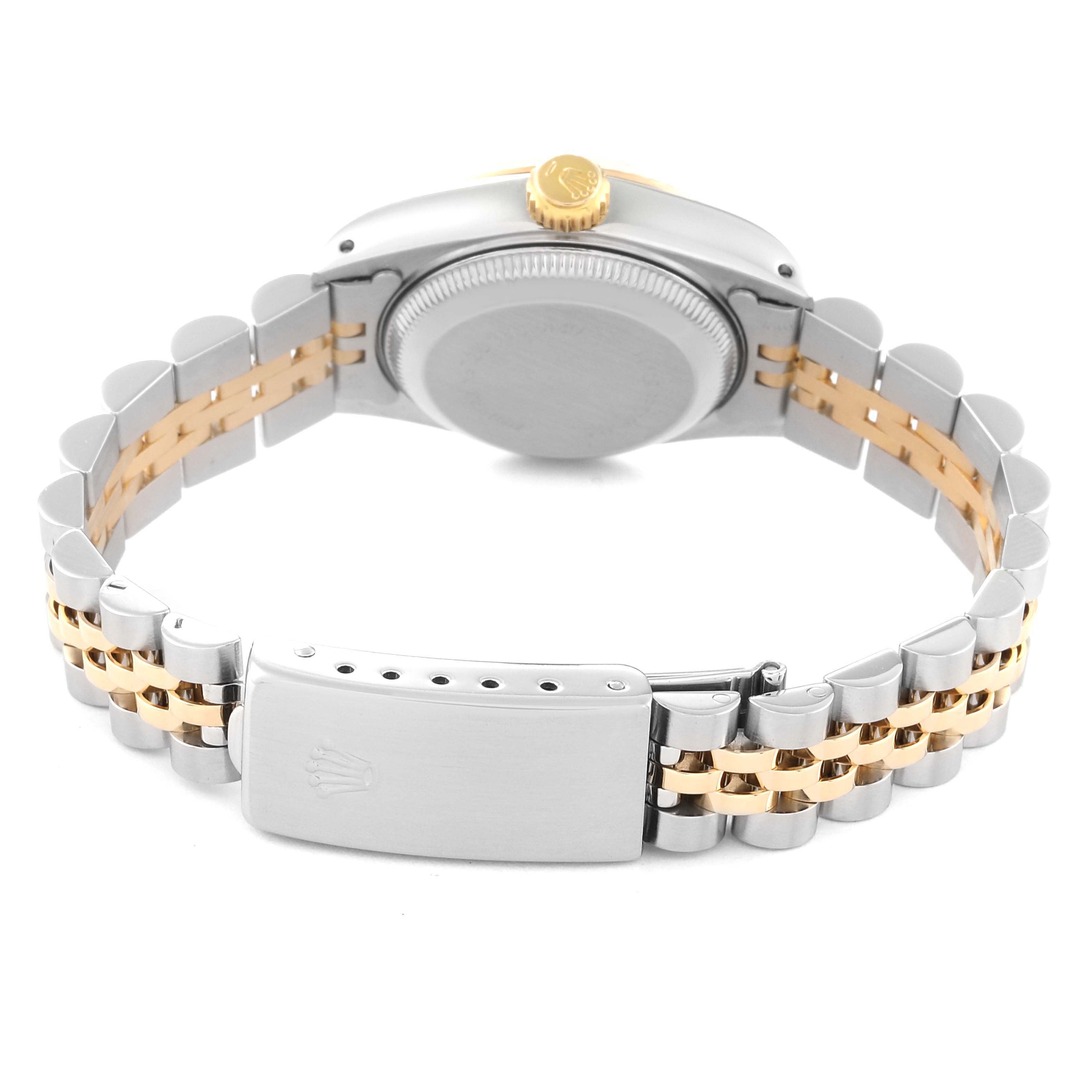 This image shows the back view of the Rolex Datejust 69173 Women's Steel and Gold (two tone) Champagne Dial 69173 Women's Steel and Gold (two tone) Champagne Dial's case, crown, and two-tone Jubilee bracelet with the clasp open.