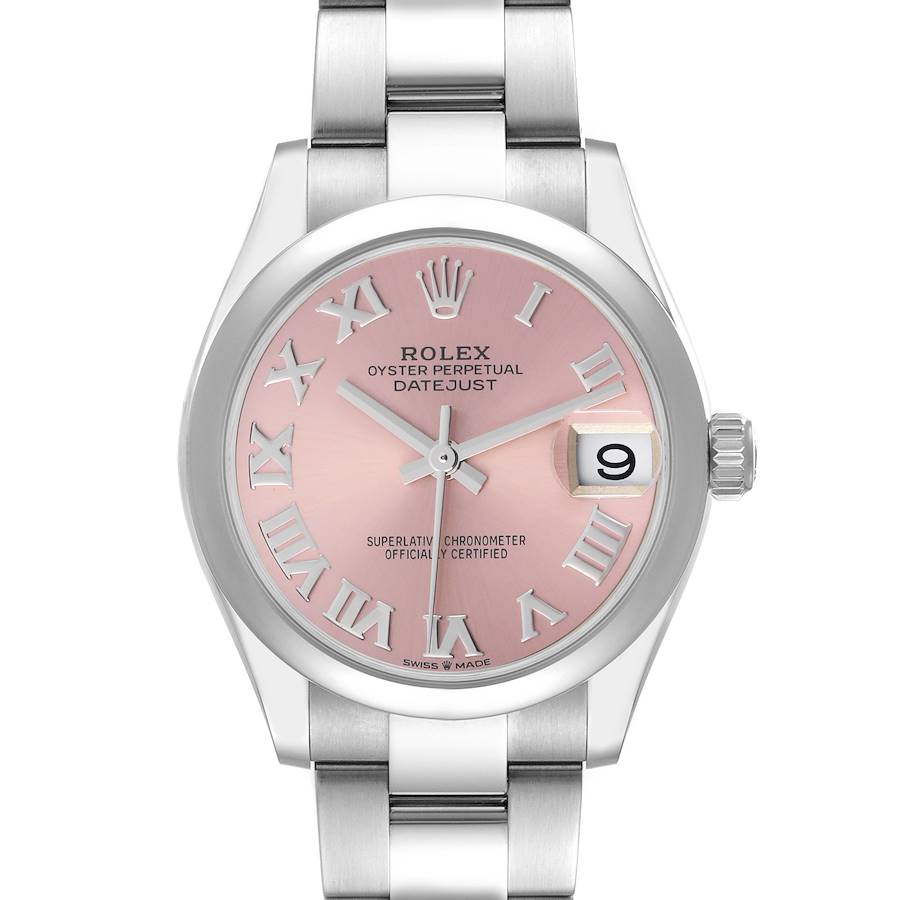 The Rolex Mid-Size watch is shown from a front angle, displaying its pink dial, Roman numerals, and the date window.