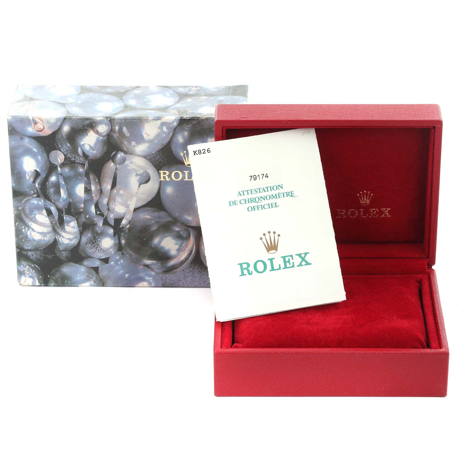 The image shows a Rolex Datejust 79174 Women's Stainless Steel Pink Dial 79174 Women's Stainless Steel Pink Dial box and warranty booklet, with the open red box revealing its interior.