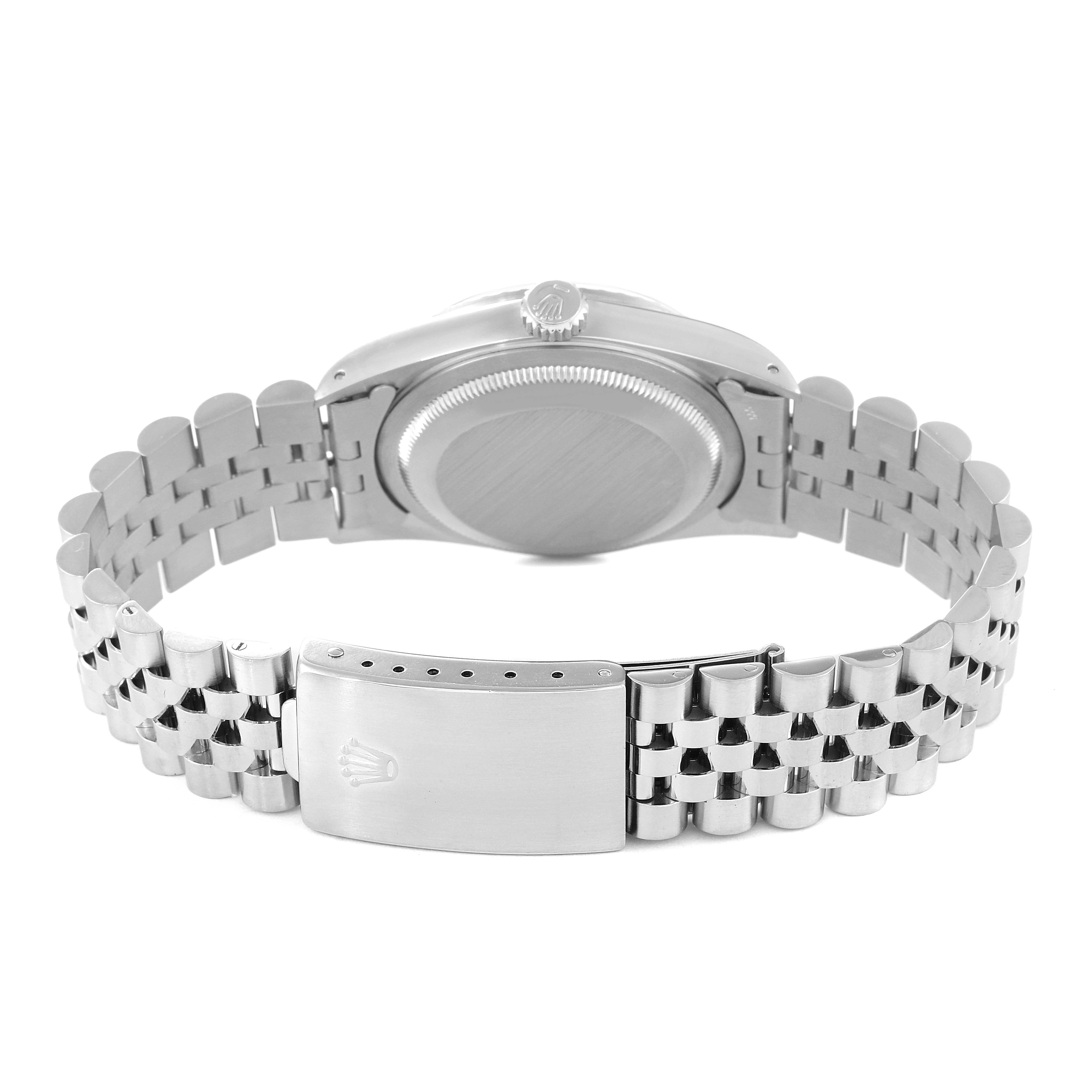 The image shows the back view of a Rolex Datejust 16220 Men's Stainless Steel Silver Dial 16220 Men's Stainless Steel Silver Dial watch, including the case back and stainless steel bracelet with a clasp.