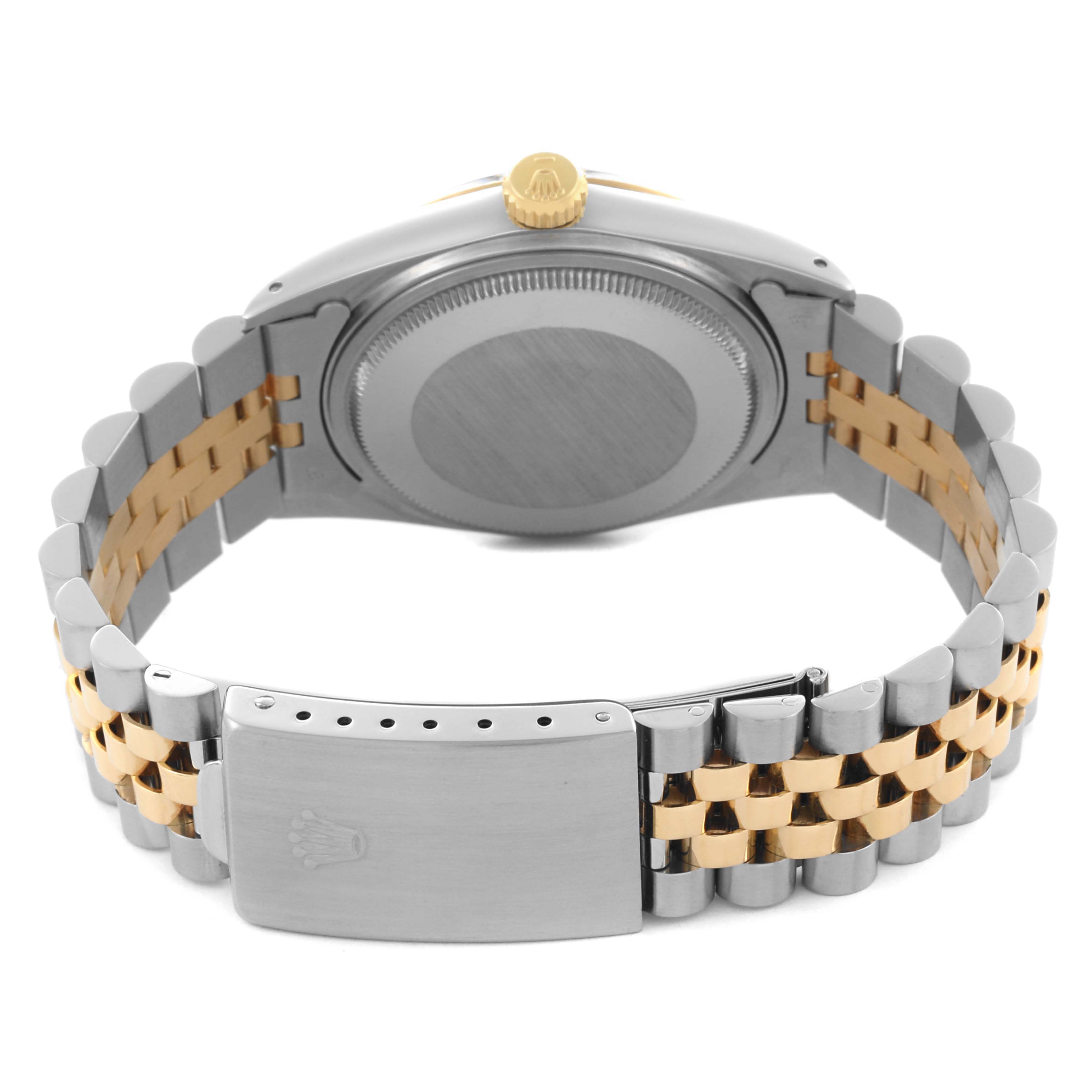 The image shows the Datejust by Rolex from the back, highlighting the case back, bracelet, and clasp.