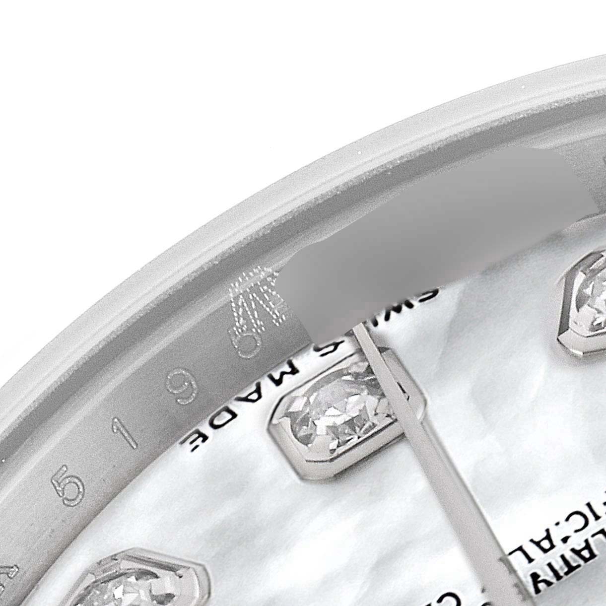 The image shows a close-up of the dial and bezel of a Rolex Datejust 179174 Women's Stainless Steel Mother of Pearl Dial 179174 Women's Stainless Steel Mother of Pearl Dial watch, highlighting diamond markers and part of the "Swiss Made" text.