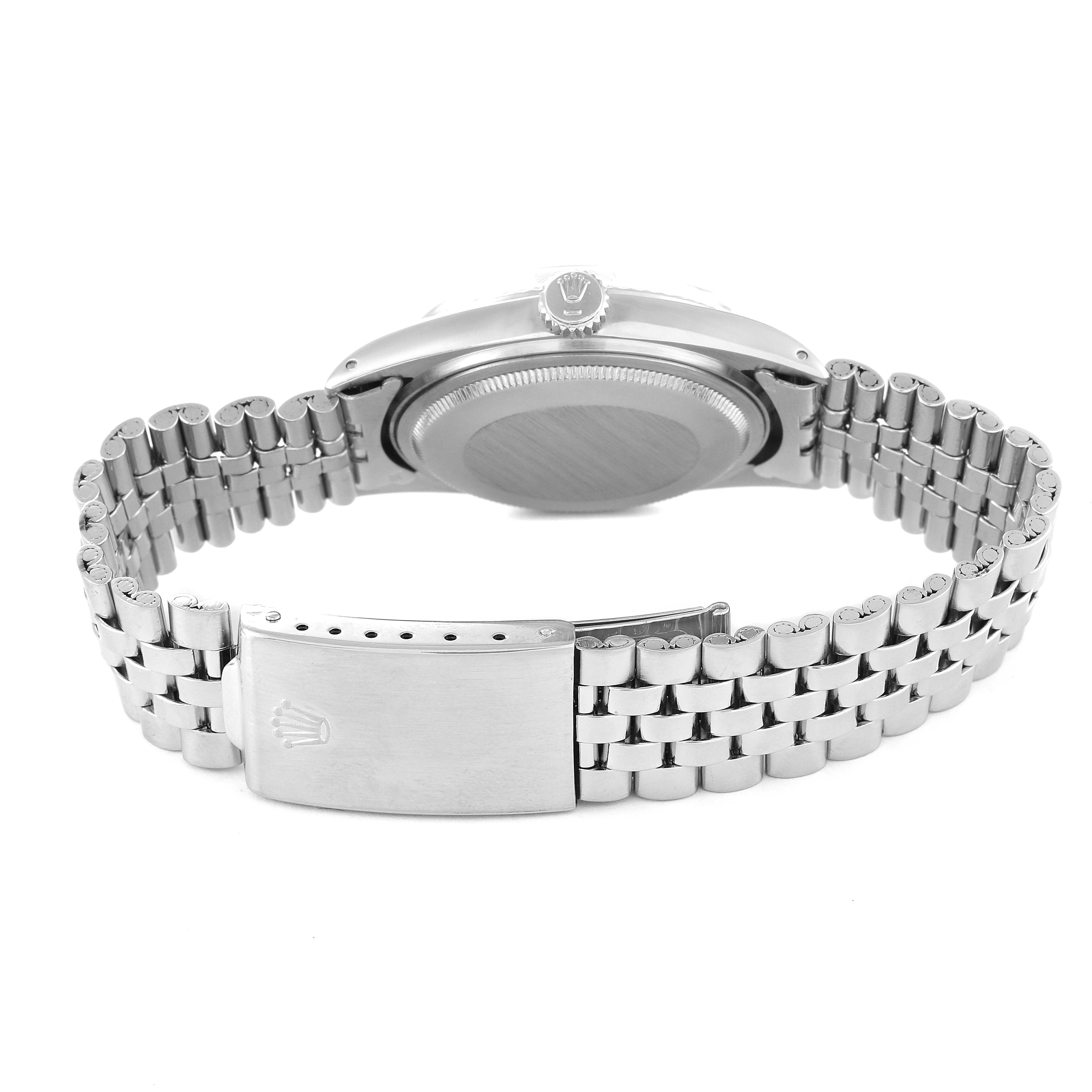 This image depicts the back view of the Rolex Vintage Collection 1601 Men's Stainless Steel Silver Dial 1601 Men's Stainless Steel Silver Dial watch, showcasing the bracelet, clasp, and watch case.