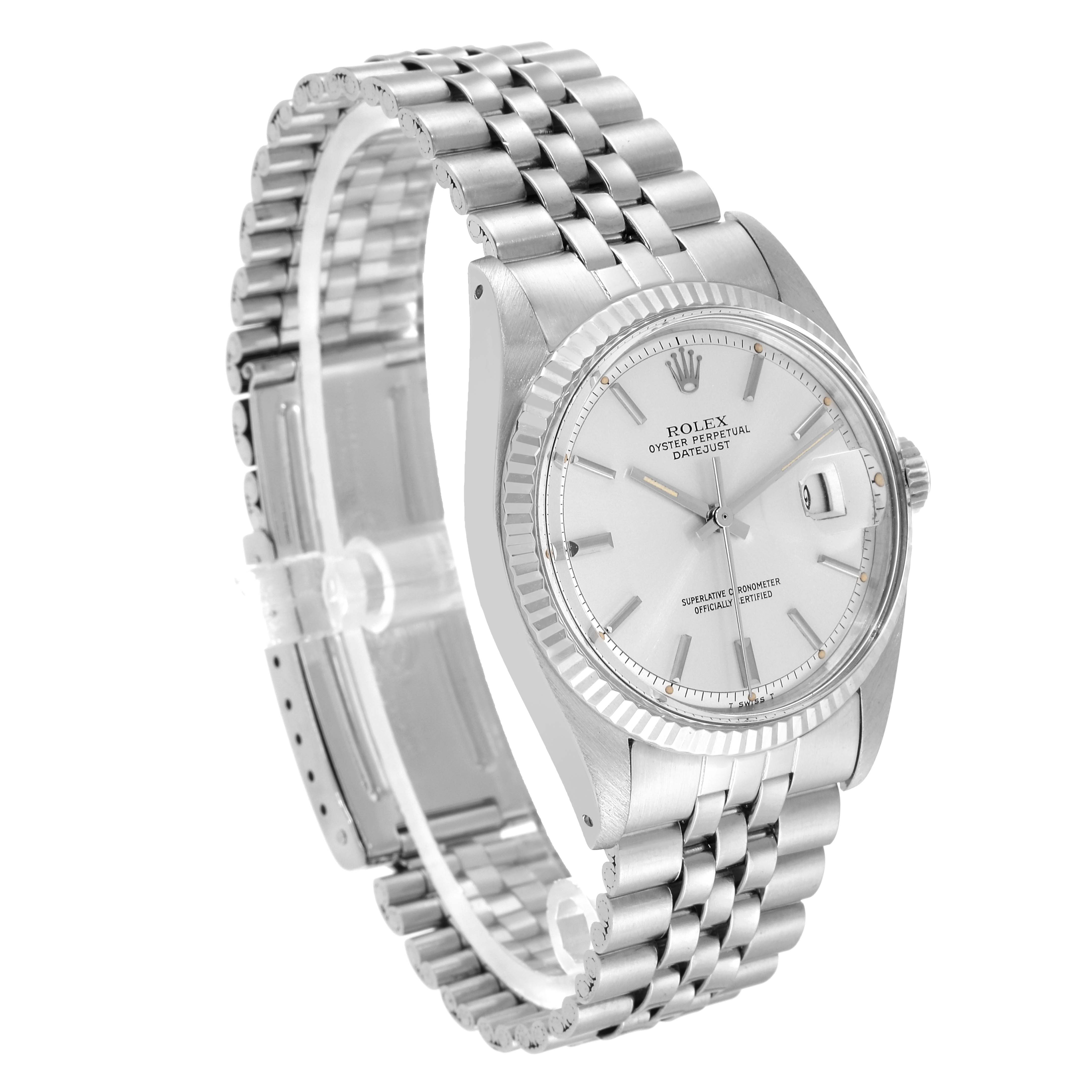 The Vintage Collection Rolex watch is shown at a slight angle, highlighting its dial, bezel, and metal bracelet.
