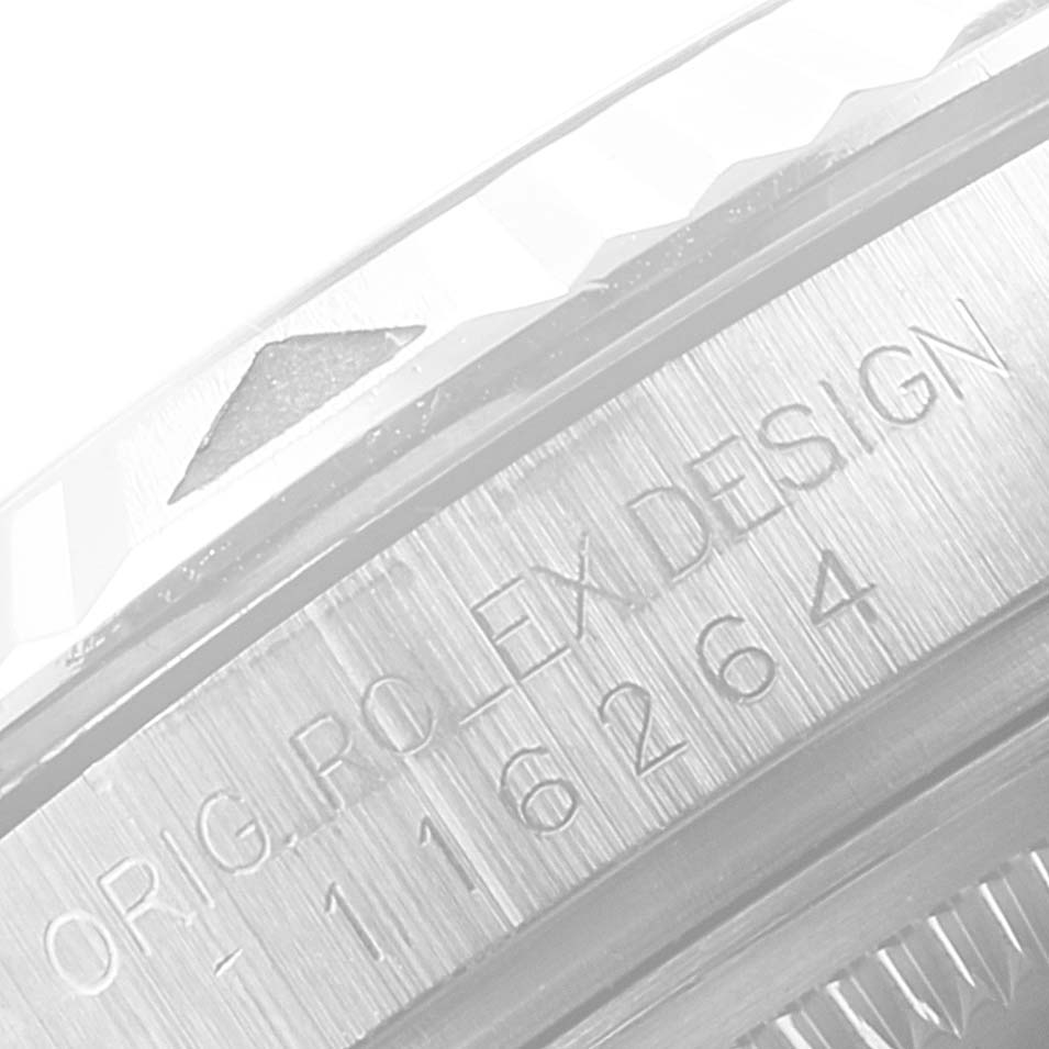 This close-up image shows the engraved bezel and case edge of a Rolex Turn-o-Graph 116264 Men
s Stainless Steel Black Dial 116264 Men
s Stainless Steel Black Dial watch.