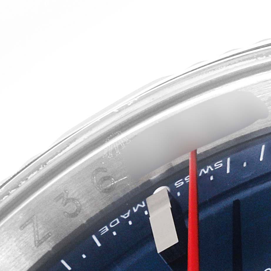 This image shows a close-up of the bezel, a red second hand, and part of the dial of a Rolex Turn-o-Graph 116264 Men
s Stainless Steel Blue Dial 116264 Men
s Stainless Steel Blue Dial watch.