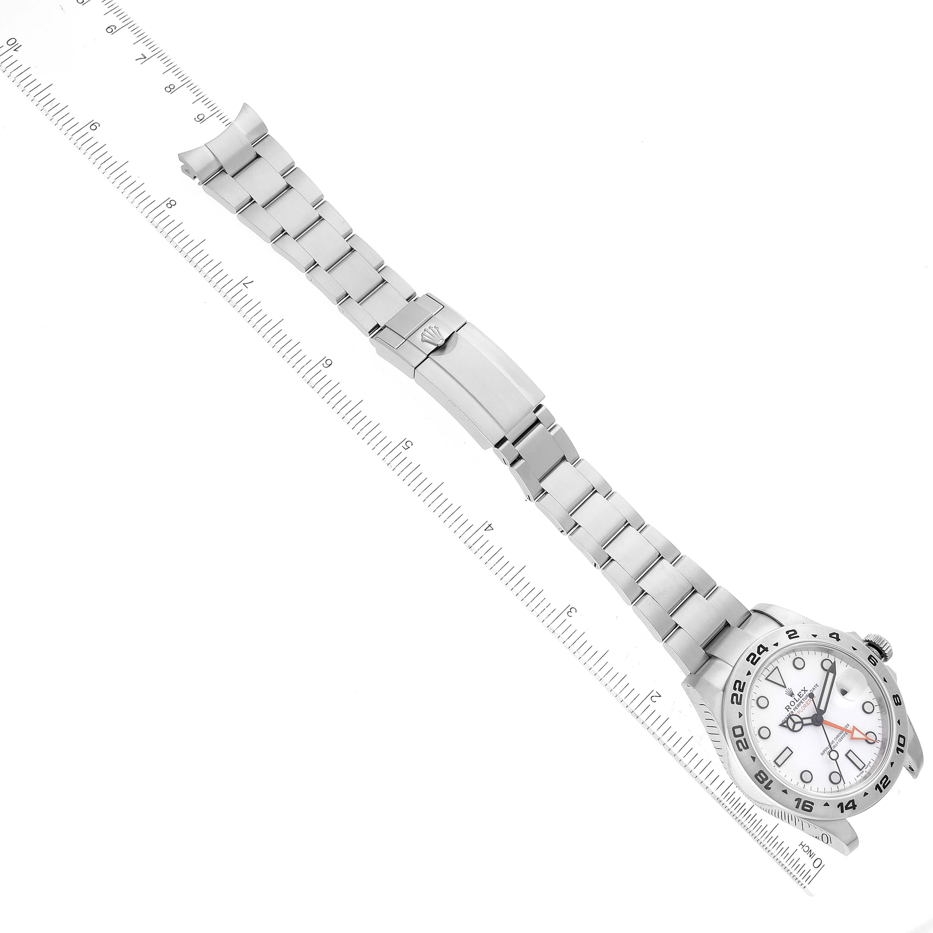 The image shows a top-down view of a Rolex Explorer 216570 Men
s Stainless Steel White Dial 216570 Men
s Stainless Steel White Dial watch, focusing on the full length of the band and watch face.