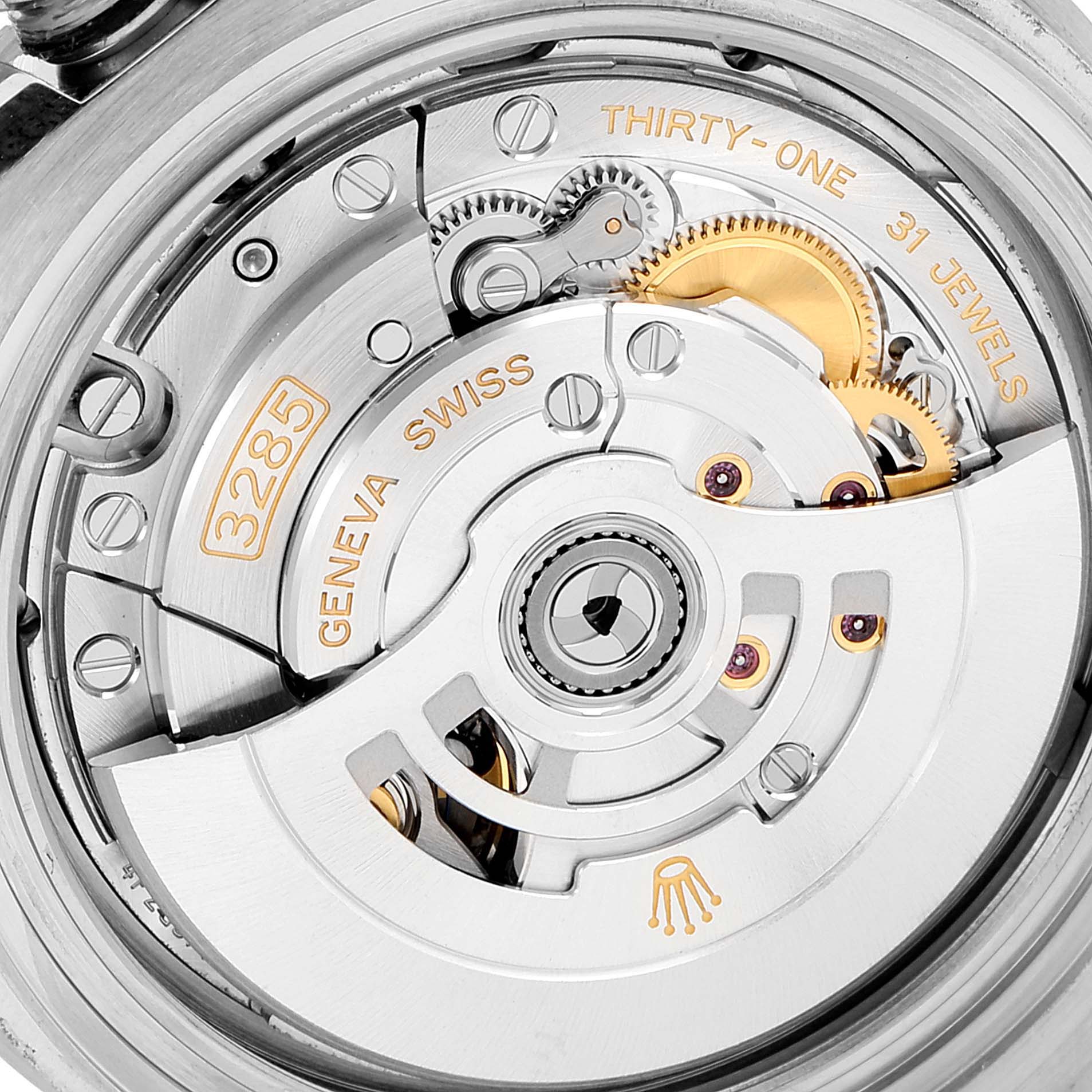 The image shows a close-up of the movement mechanism of the Rolex GMT-Master 126710 Men
s Stainless Steel Black Dial 126710 Men
s Stainless Steel Black Dial 3285 model.