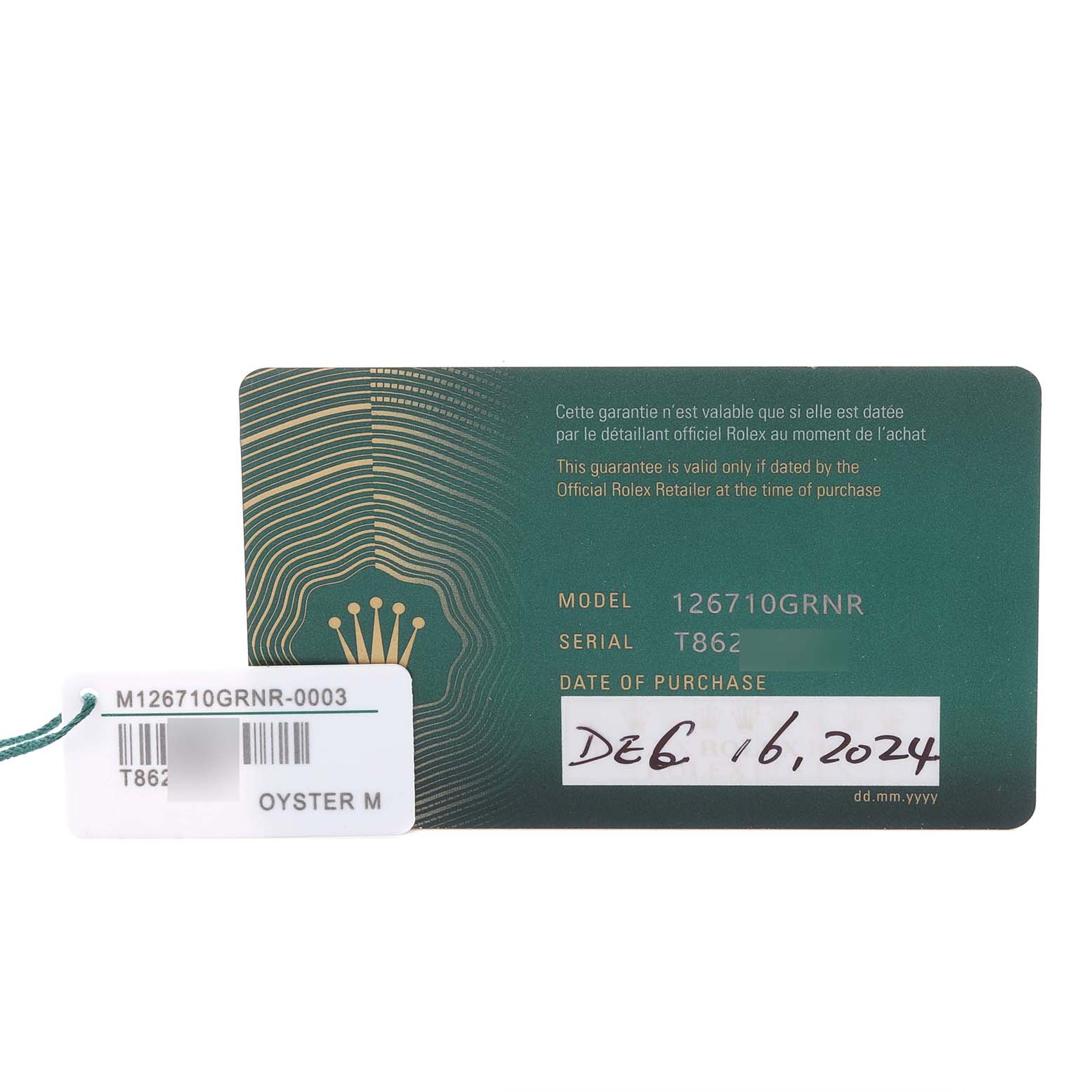 The image shows a warranty card and tag for a Rolex GMT-Master 126710GRNR Men
s Stainless Steel Black Dial 126710GRNR Men
s Stainless Steel Black Dial model, with model and serial numbers visible.