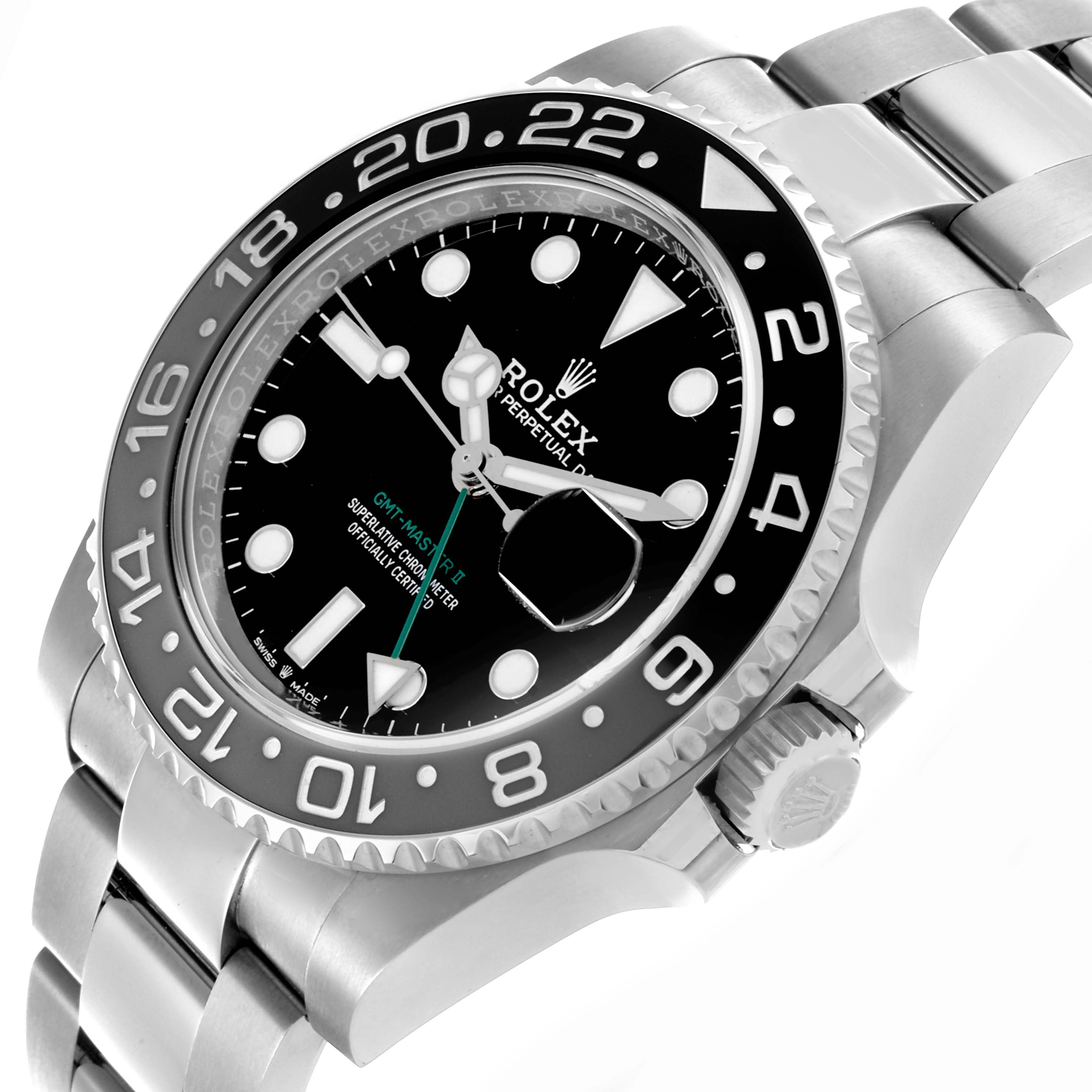 The Rolex GMT-Master 126710GRNR Men's Stainless Steel Black Dial 126710GRNR Men's Stainless Steel Black Dial watch is shown at a tilted angle, highlighting the dial, bezel, crown, and part of the bracelet.