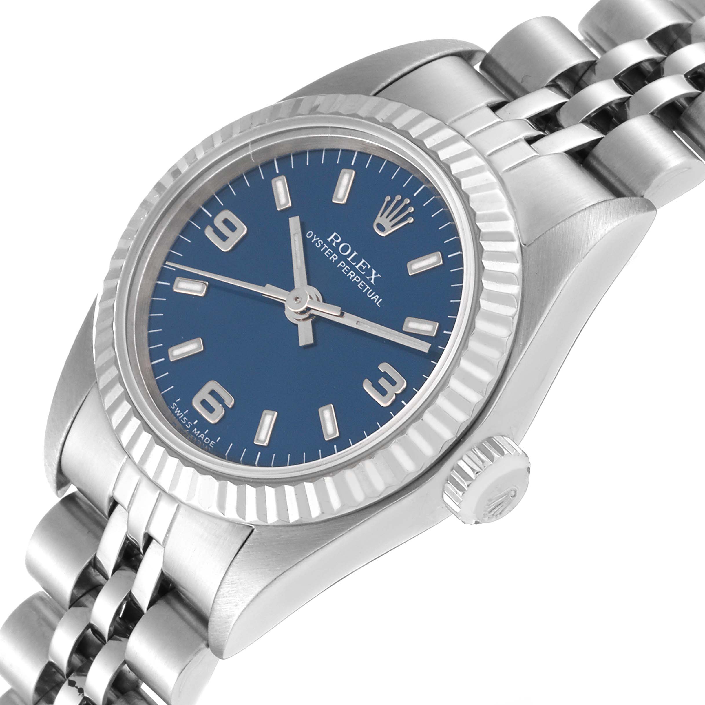 This image shows a top-side angle of the Rolex Oyster Perpetual 76094 Women's Stainless Steel Blue Dial 76094 Women's Stainless Steel Blue Dial watch, highlighting the blue dial, bezel, and part of the bracelet.