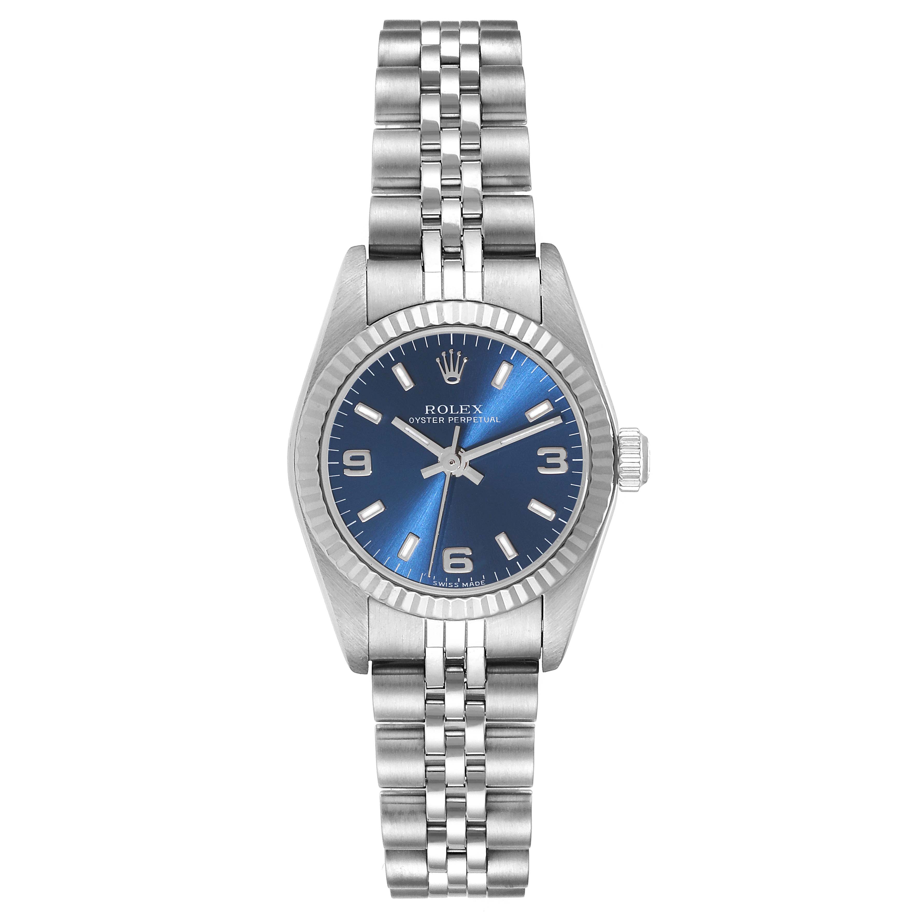 The image shows a front view of a Rolex Oyster Perpetual 76094 Women's Stainless Steel Blue Dial 76094 Women's Stainless Steel Blue Dial watch, highlighting its blue dial, bezel, and bracelet.