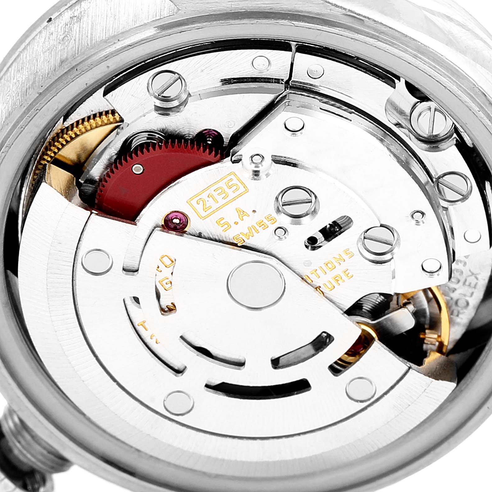 This close-up view shows the intricate inner mechanics of the Rolex President 69179 Women
s White Gold Silver Dial 69179 Women
s White Gold Silver Dial model watch.