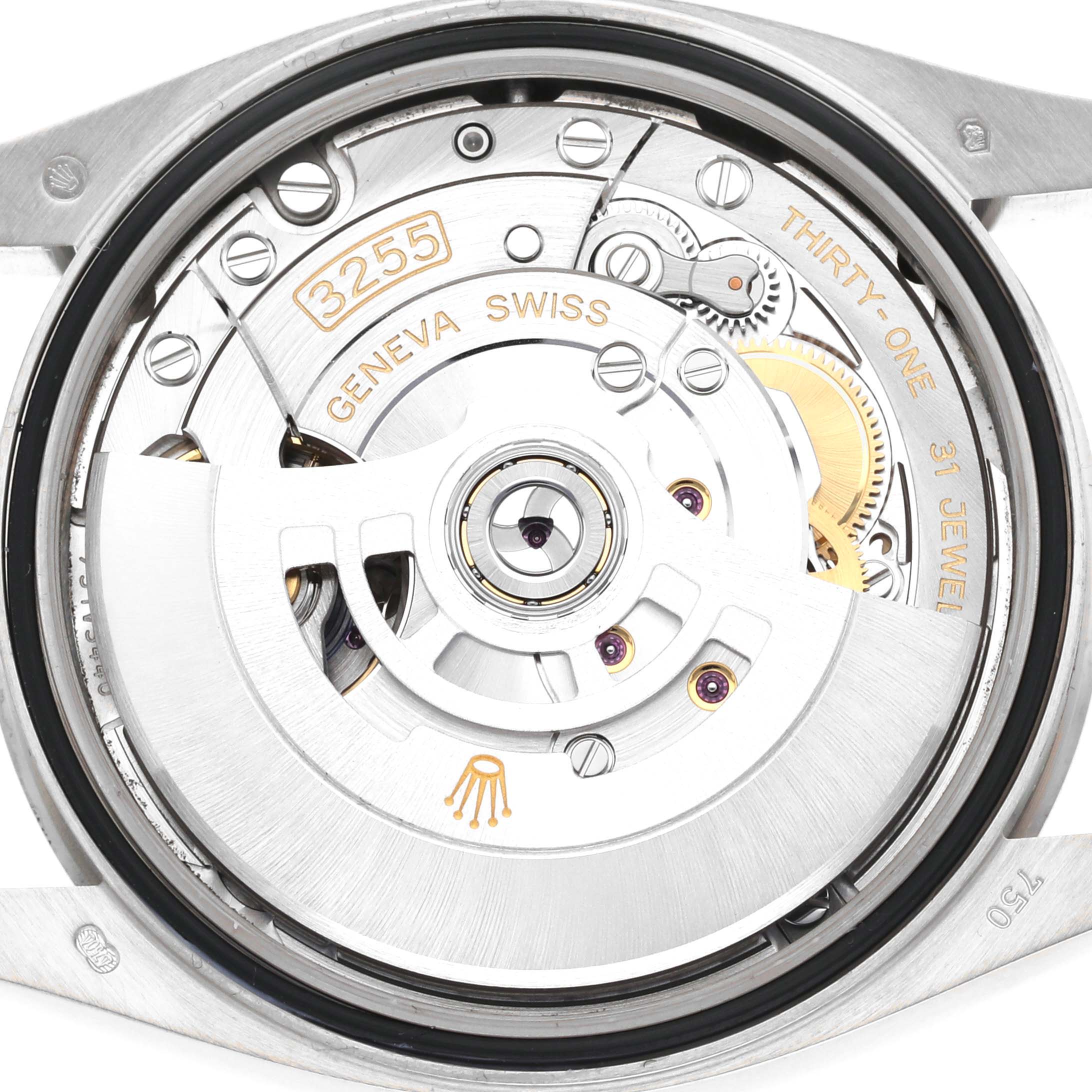 The image shows the back view of a Rolex President 128239 Men
s White Gold Blue Dial 128239 Men
s White Gold Blue Dial model, highlighting its intricate movement and rotor mechanism.