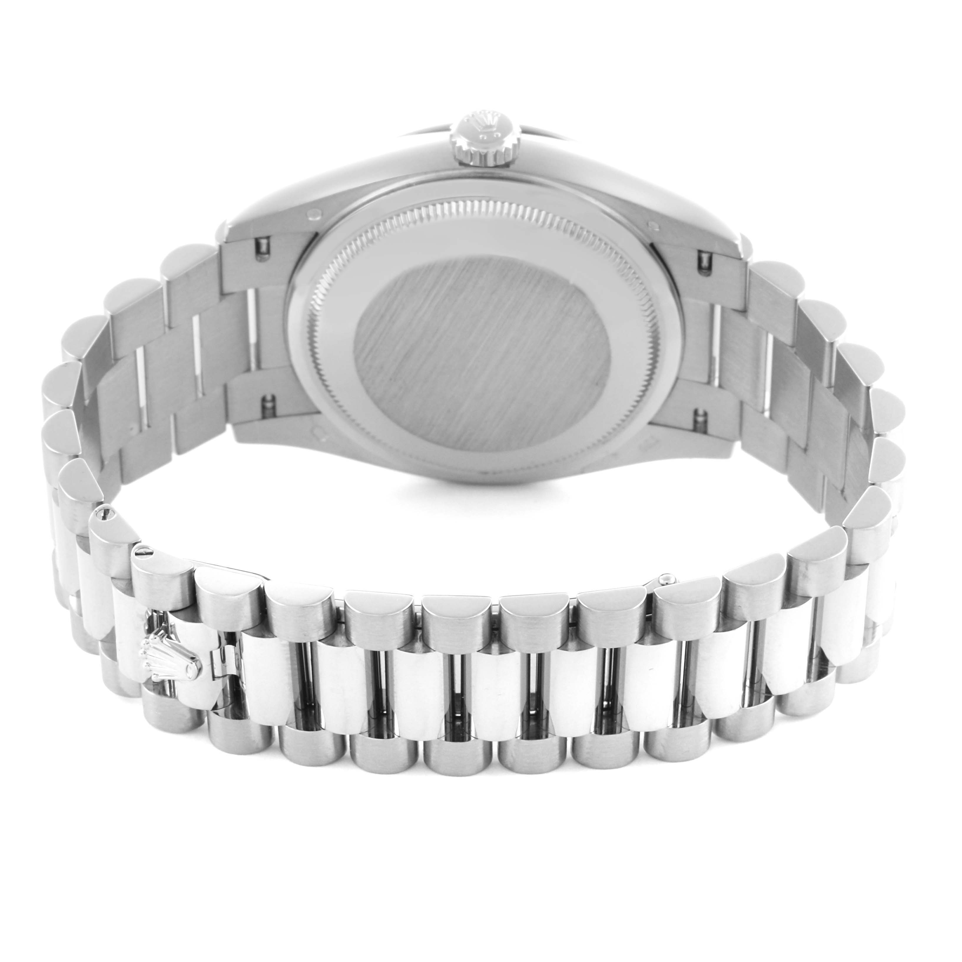 The image shows the back view of the Rolex President 128239 Men
s White Gold Blue Dial 128239 Men
s White Gold Blue Dial model, highlighting the case back and bracelet.