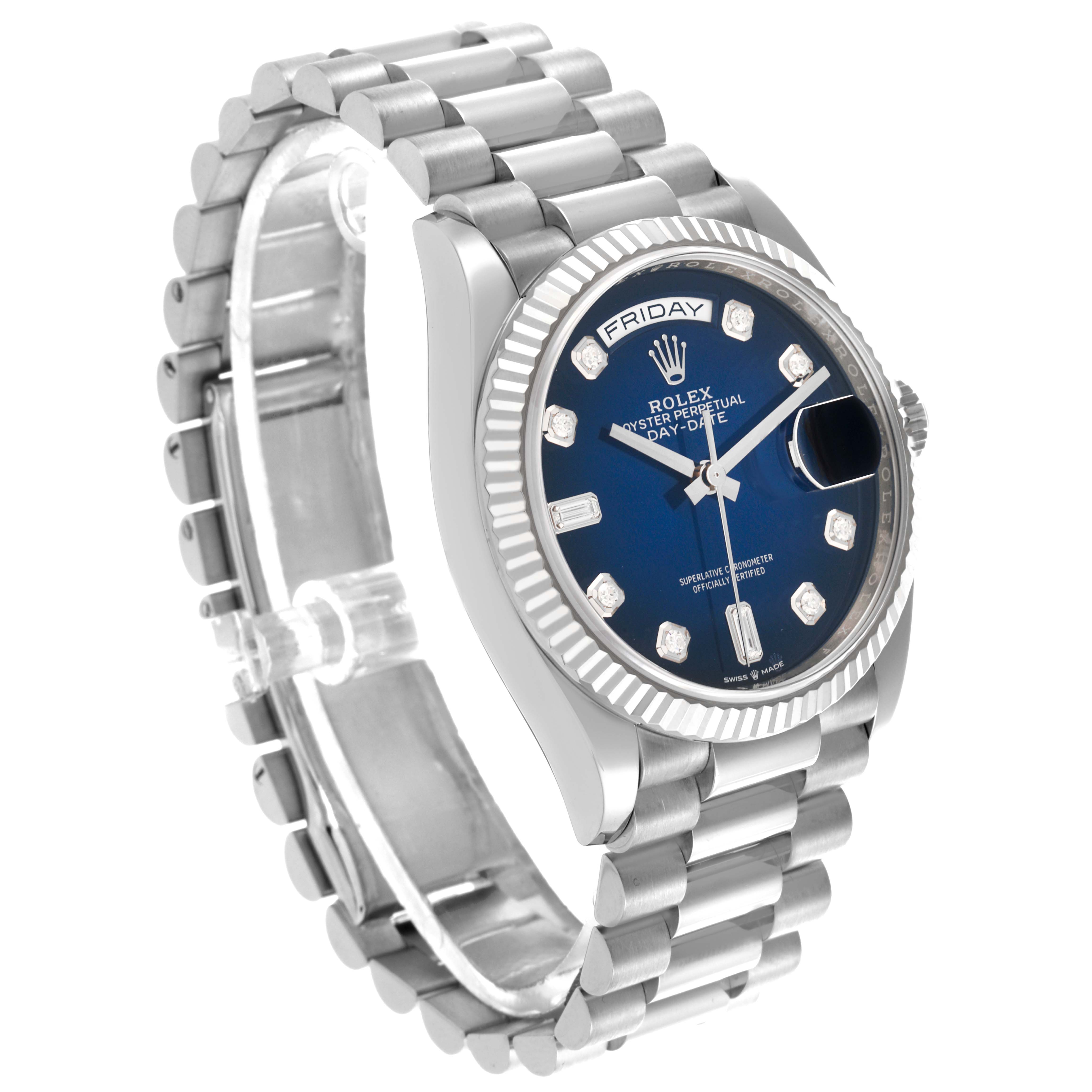 The Rolex President 128239 Men
s White Gold Blue Dial 128239 Men
s White Gold Blue Dial watch is shown at a three-quarter angle, displaying the bracelet, bezel, and face with blue dial and day-date window.