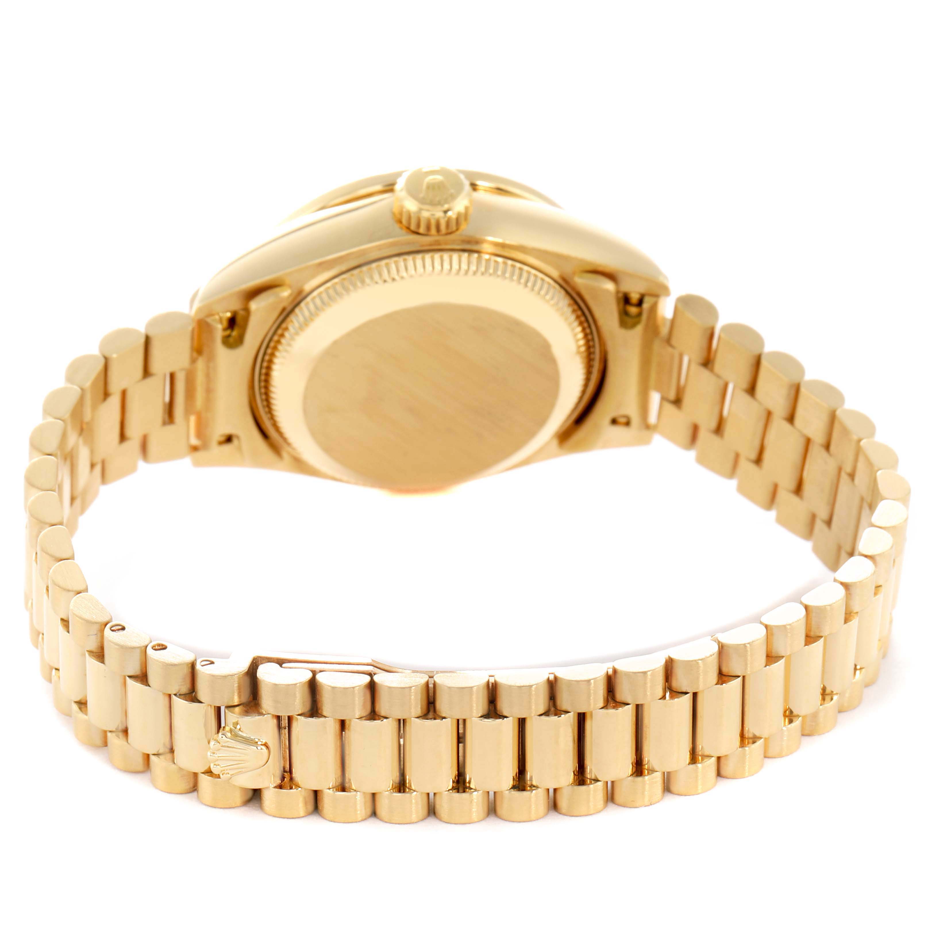 The image shows a rear angle of a Rolex President 69158 Women's Yellow Gold Silver Dial model watch, highlighting its case back and bracelet.