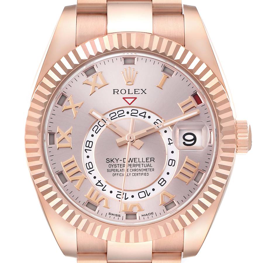 The Rolex Sky-Dweller watch is shown from a frontal angle, highlighting the dial, bezel, hands, and date window.