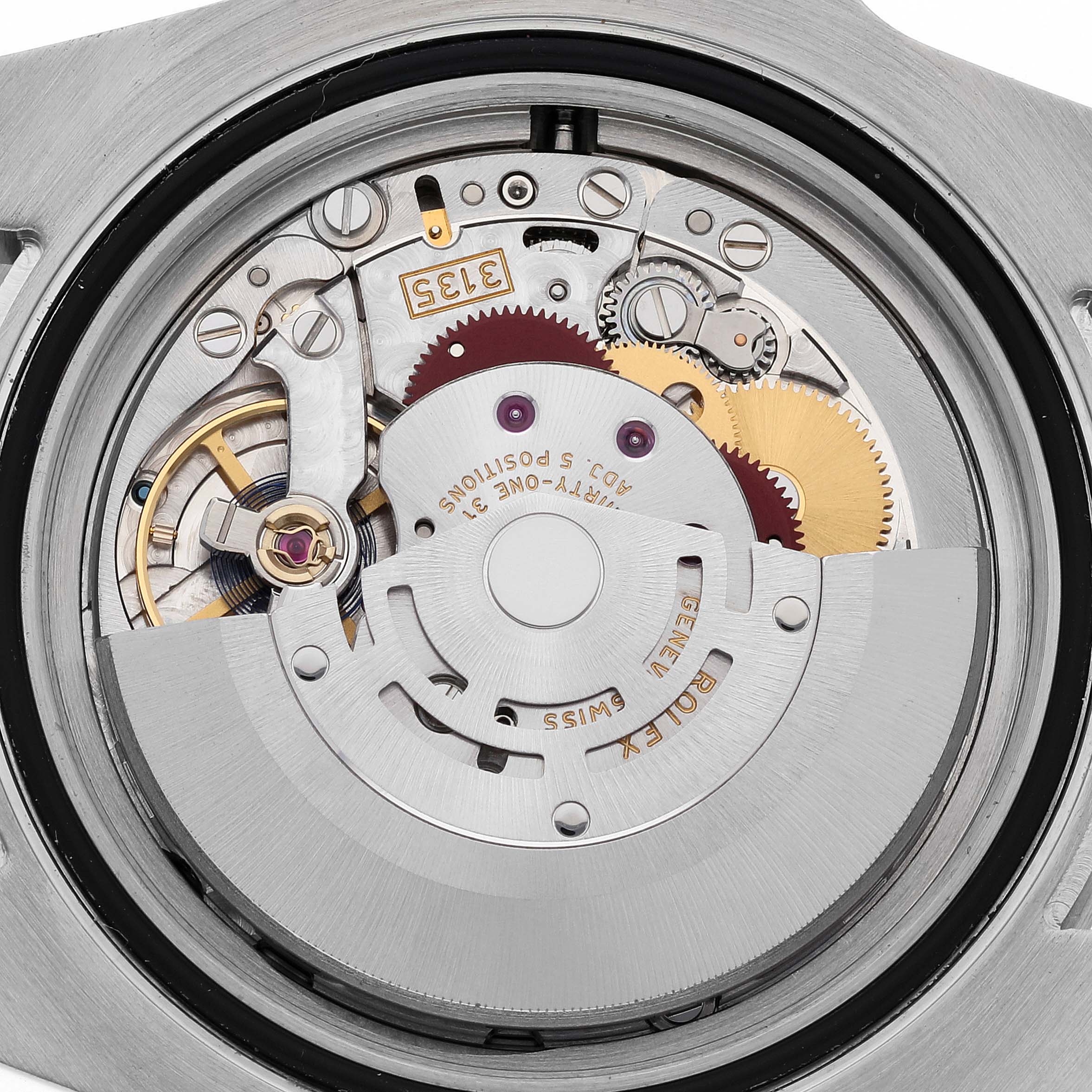 The image shows the intricate internal movement mechanism of a Rolex Submariner 116610LV Men's Stainless Steel Green Dial 116610LV Men's Stainless Steel Green Dial watch from a rear angle.