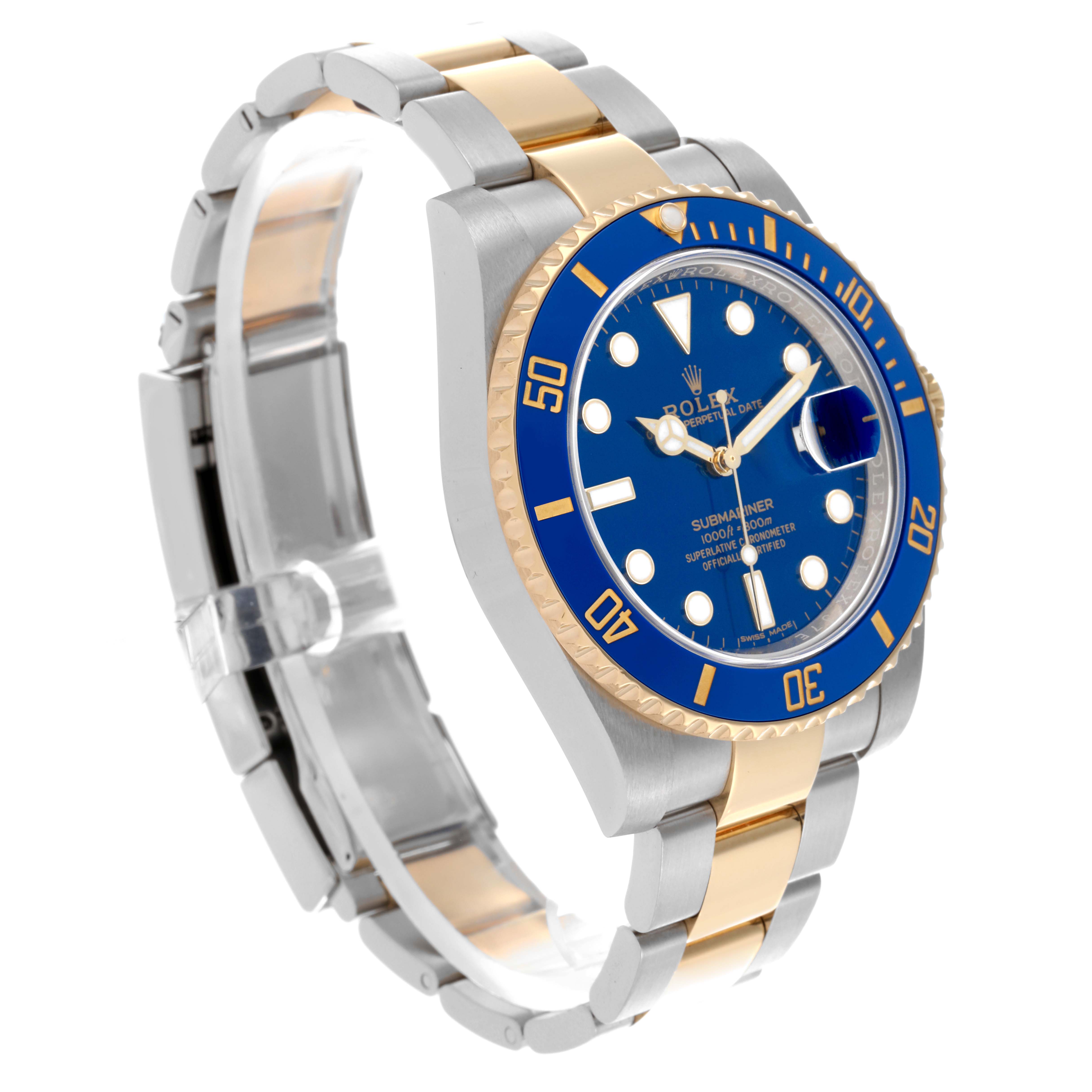 The Rolex Submariner 116613LB Men's Steel and Gold (two tone) Blue Dial 116613LB Men's Steel and Gold (two tone) Blue Dial watch is shown at a side angle, highlighting its blue bezel, blue dial, and two-tone metal bracelet.