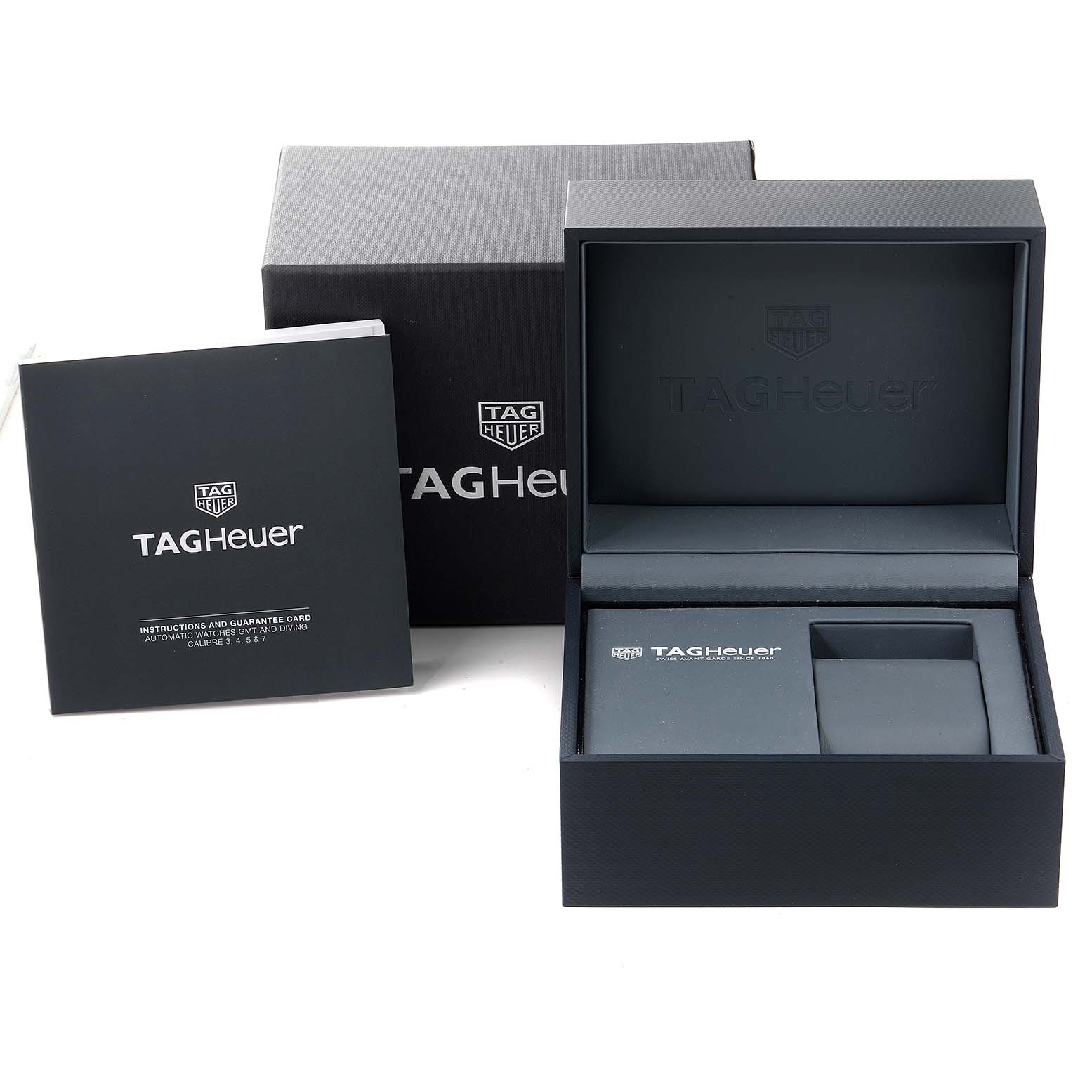 This image shows the open box and the manual for the Tag Heuer Aquaracer WBP201A.BA0632 Men's Stainless Steel Black Dial WBP201A.BA0632 Men's Stainless Steel Black Dial watch.
