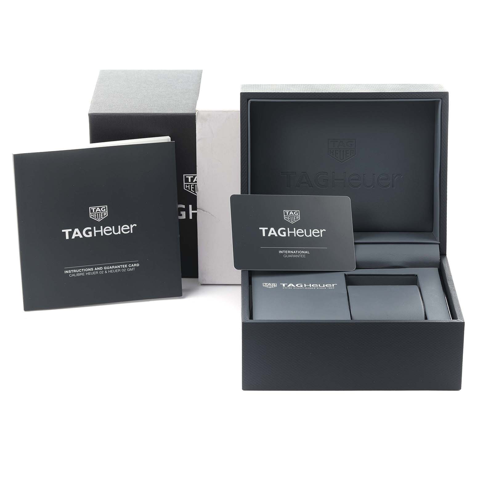 The image shows the box, manual, and warranty card of a Tag Heuer Carrera CBG2A1Z Men's Stainless Steel Transparent Dial CBG2A1Z Men's Stainless Steel Transparent Dial watch.