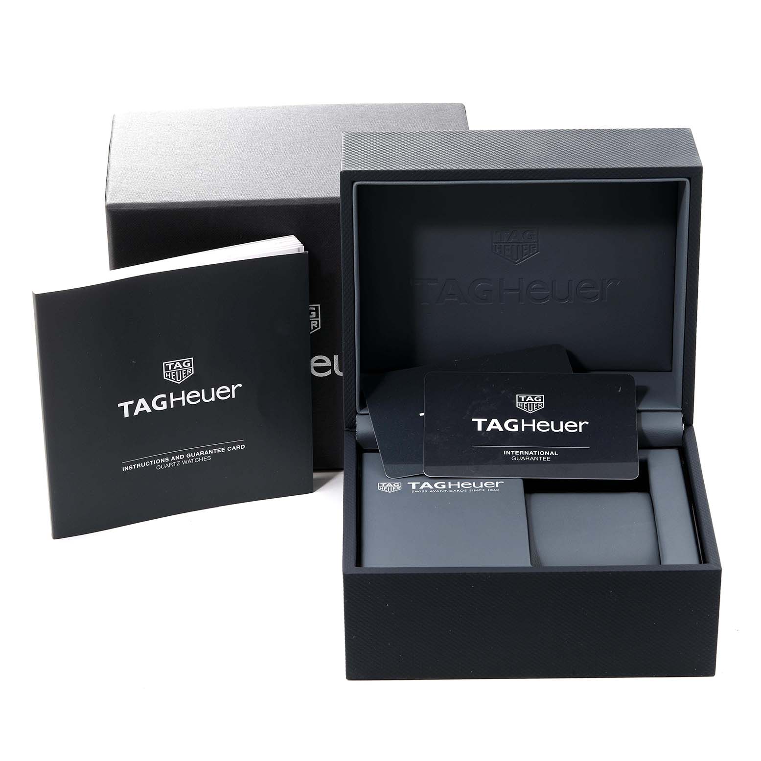 The image shows the packaging, instruction manual, and warranty card for the Tag Heuer Carrera WBG1312 Women's Stainless Steel Mother of Pearl Dial WBG1312 Women's Stainless Steel Mother of Pearl Dial watch.