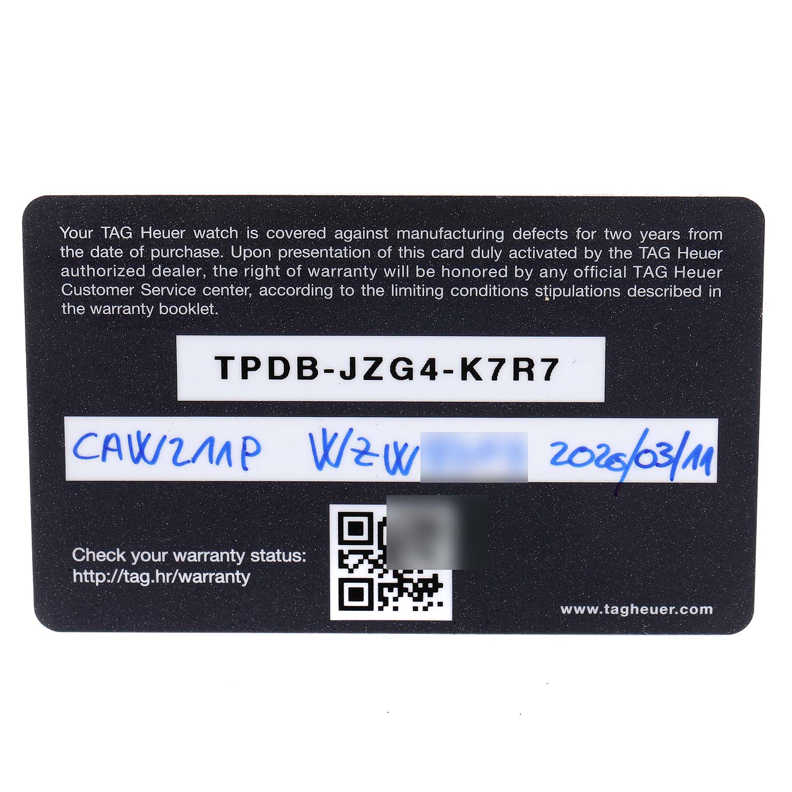 This is a warranty card for a Tag Heuer Monaco CAW211P Men's Stainless Steel Blue Dial CAW211P Men's Stainless Steel Blue Dial model watch, displaying the serial number and warranty information.