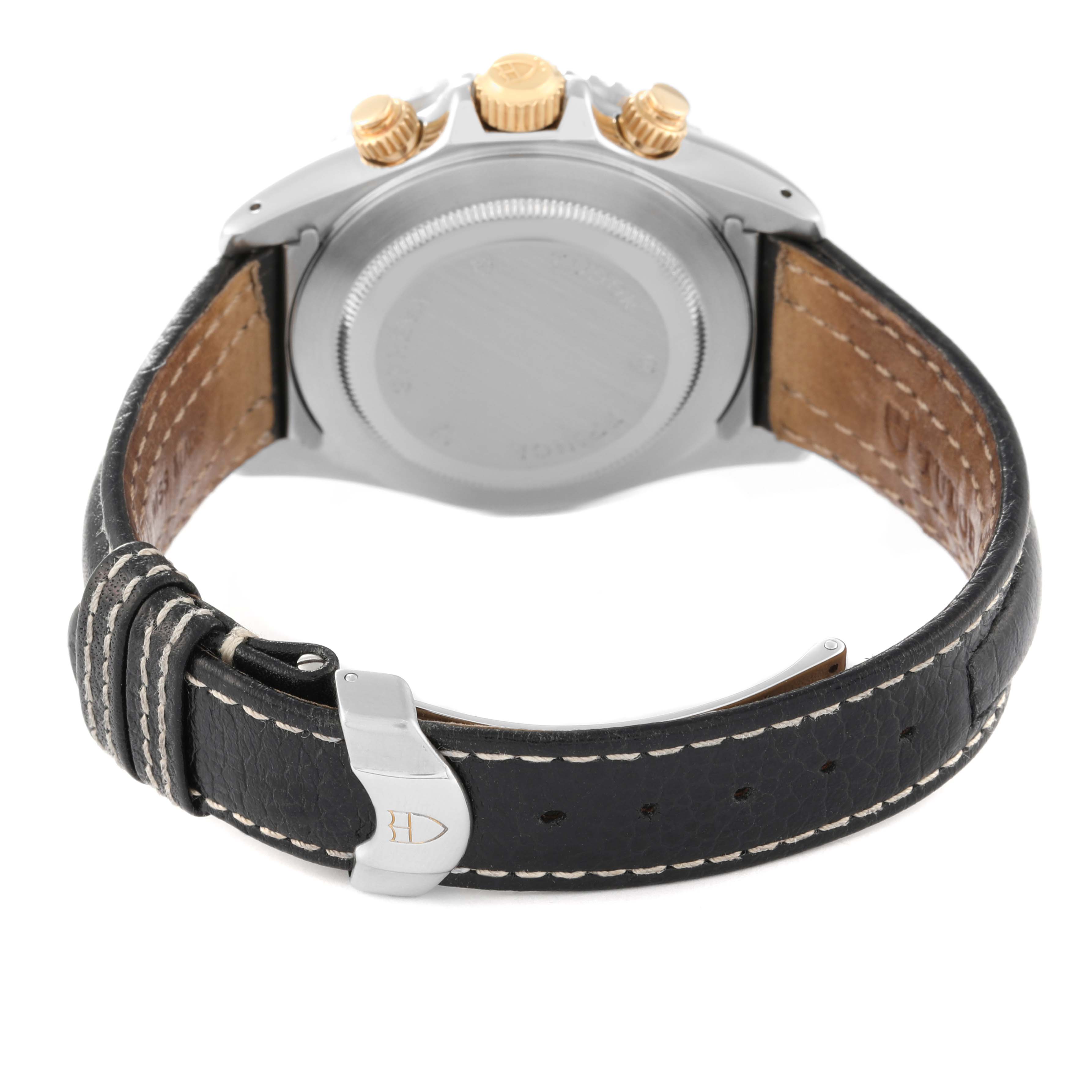 The image shows the back view of a Tudor Tiger 79273P Men's Steel and Gold (two tone) White Dial 79273P Men's Steel and Gold (two tone) White Dial model watch, featuring its case back, leather strap, and clasp.