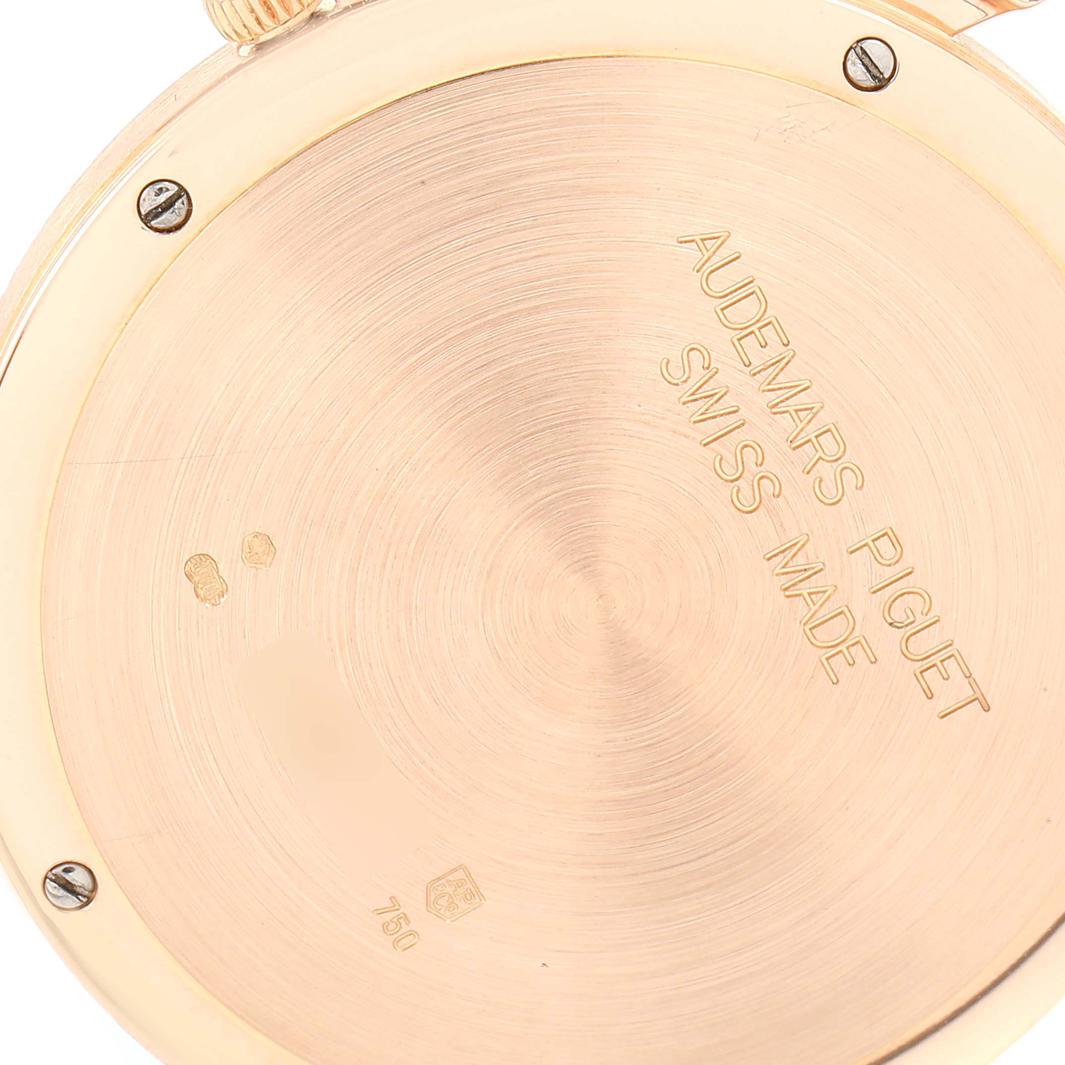 This image shows the back case of the Audemars Piguet Jules 15103OR Men's Rose Gold White Dial 15103OR Men's Rose Gold White Dial model watch, with screws and engraving visible.